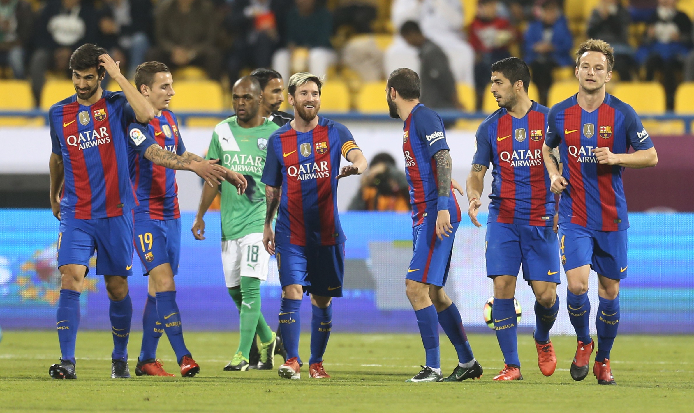 DOHA, QATAR - DECEMBER 13: Lionel Messi of Barcelona celebrates scoring a goal  against Al-Ahli Saudi FC during the Qatar Airways Cup match between FC Barcelona and Al-Ahli Saudi FC on December 13, 2016 in Doha, Qatar. (Photo by AK BijuRaj/Getty Images)
