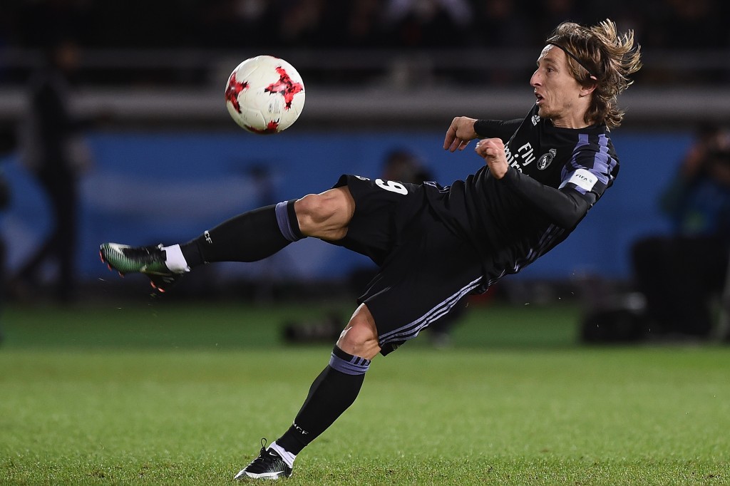 YOKOHAMA, JAPAN - DECEMBER 15: Luka Modric of Real Madrid attempts a shot at goal during the FIFA Club World Cup Japan semi-final match between Club America v Real Madrid at International Stadium Yokohama on December 15, 2016 in Yokohama, Japan. (Photo by Matt Roberts/Getty Images,)