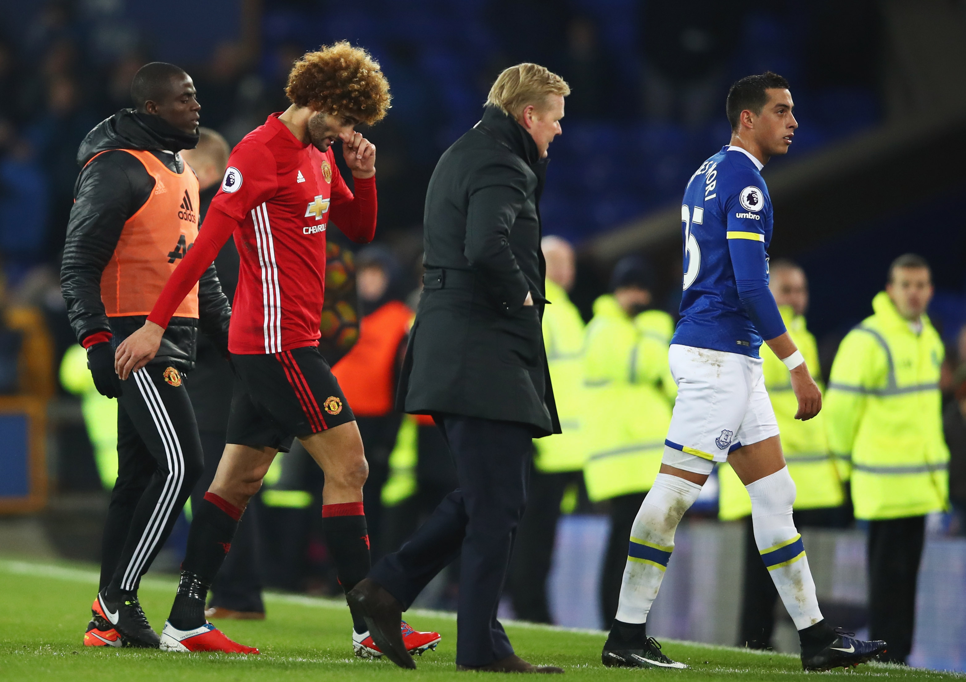 LIVERPOOL, ENGLAND - DECEMBER 04:  Marouane Fellaini of Manchester United (2L) looks dejected after the Premier League match between Everton and Manchester United at Goodison Park on December 4, 2016 in Liverpool, England.  (Photo by Clive Brunskill/Getty Images)