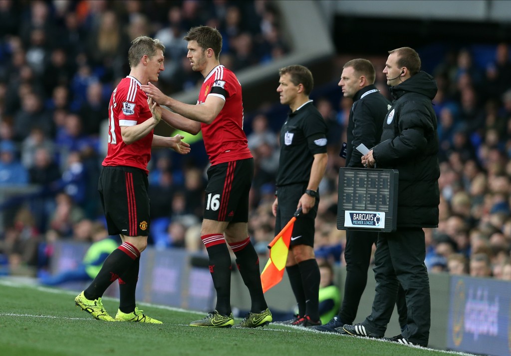 LIVERPOOL, ENGLAND - OCTOBER 17: Bastian Schweinsteiger of Manchester United is replaced by team-mate Michael Carrick during the Barclays Premier League match between Everton and Manchester United at Goodison Park on October 17, 2015 in Liverpool, England. (Photo by Chris Brunskill/Getty Images)