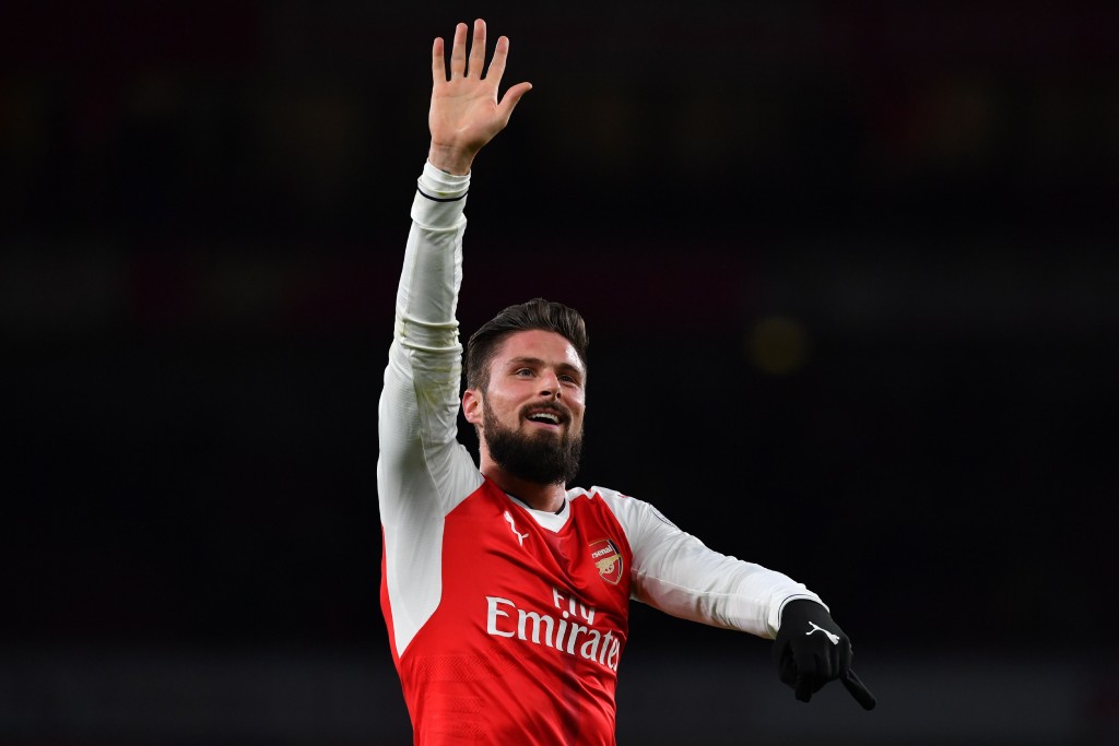 Arsenal's French striker Olivier Giroud gestures on the pitch after the English Premier League football match between Arsenal and Bournemouth at the Emirates Stadium in London on November 27, 2016. Arsenal won the game 3-1. / AFP / Ben STANSALL / RESTRICTED TO EDITORIAL USE. No use with unauthorized audio, video, data, fixture lists, club/league logos or 'live' services. Online in-match use limited to 75 images, no video emulation. No use in betting, games or single club/league/player publications. / (Photo credit should read BEN STANSALL/AFP/Getty Images)
