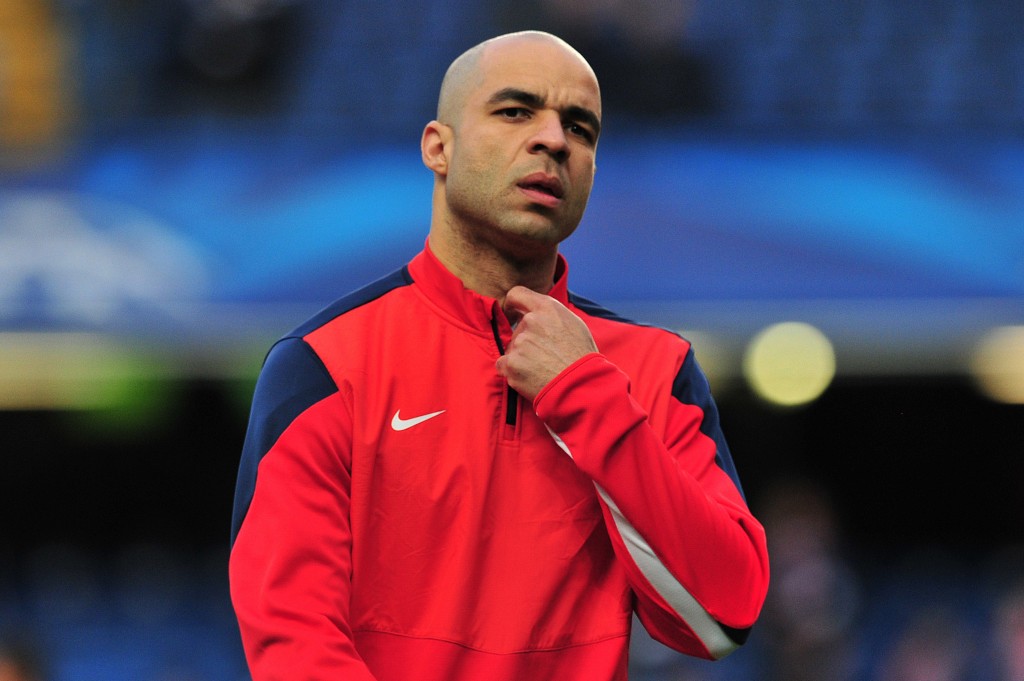 Paris' Brazilian defender Alex Costa warms up before the UEFA Champions League quarter final second leg football match between Chelsea and Paris Saint-Germain at Stamford Bridge in London on April 8, 2014. AFP PHOTO / GLYN KIRK (Photo credit should read GLYN KIRK/AFP/Getty Images)