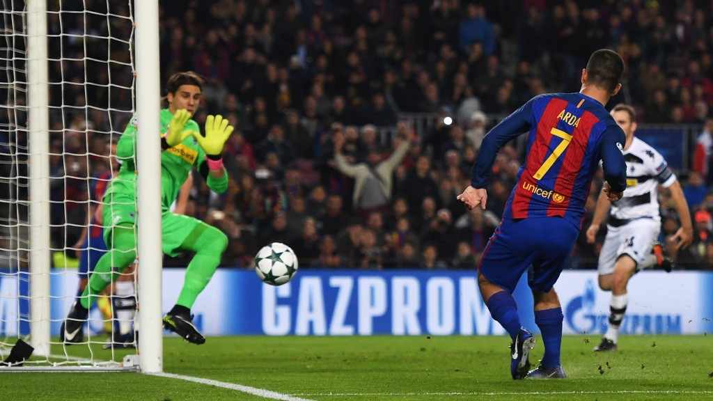 BARCELONA, SPAIN - DECEMBER 06: Arda Turan of Barcelona (R) scores his sides fourth goal during the UEFA Champions League Group C match between FC Barcelona and VfL Borussia Moenchengladbach at Camp Nou on December 6, 2016 in Barcelona, . (Photo by David Ramos/Getty Images)