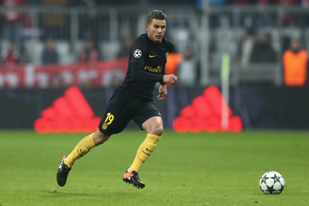 MUNICH, GERMANY - DECEMBER 06: Lucas Hernandez of Atletico runs with the ball during the UEFA Champions League match between FC Bayern Muenchen and Club Atletico de Madrid at Allianz Arena on December 6, 2016 in Munich, Bavaria. (Photo by Alexander Hassenstein/Bongarts/Getty Images)
