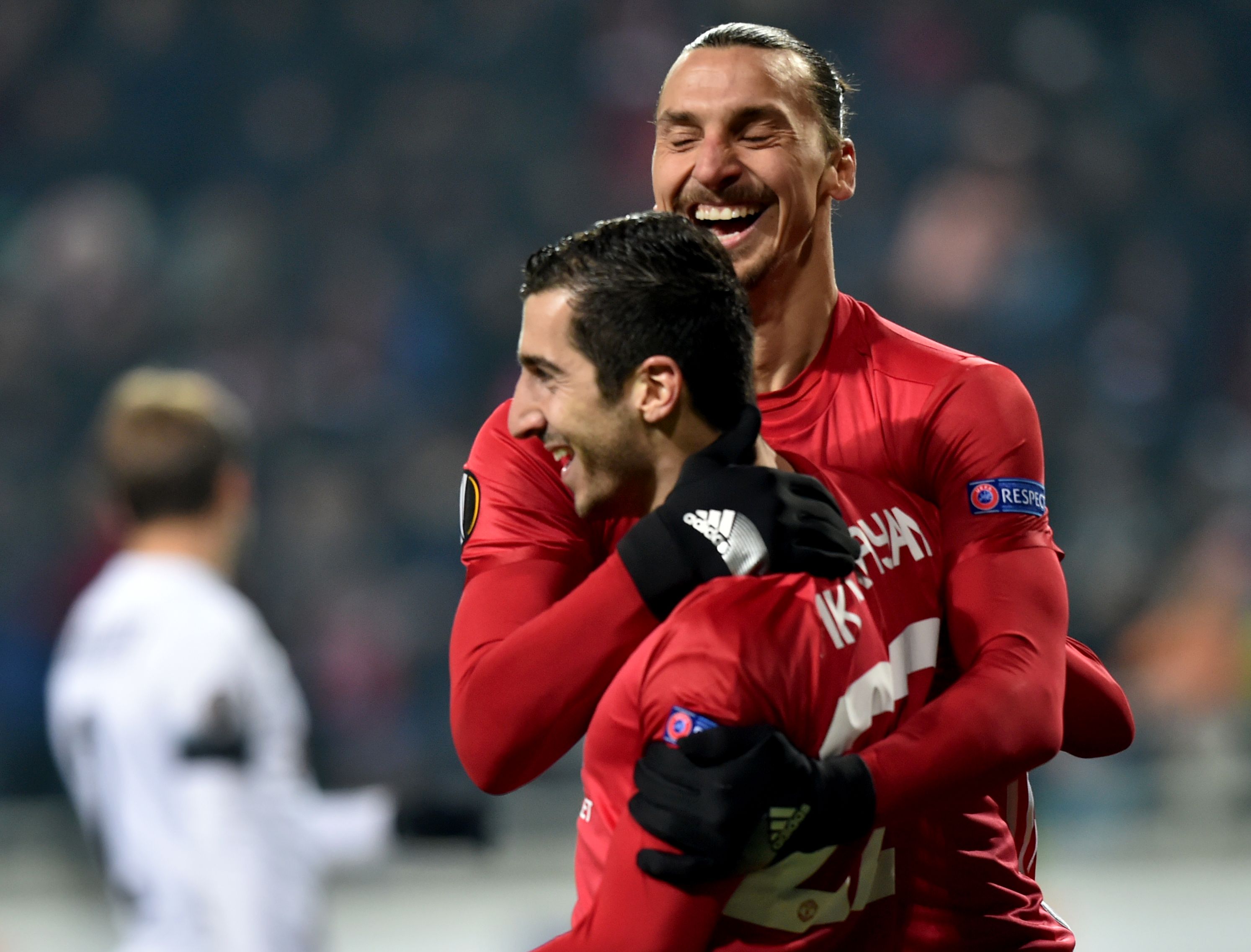 Manchester United's Armenian midfielder Henrikh Mkhitaryan (L) celebrates after scoring a goal, with teammate Swedish forward Zlatan Ibrahimovic during the UEFA Europa League football match between FC Zorya Luhansk and Manchester United FC at the Chornomorets stadium in Odessa on December 8, 2016 / AFP / Sergei SUPINSKY (Photo credit should read SERGEI SUPINSKY/AFP/Getty Images)
