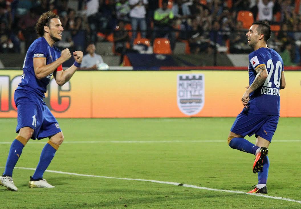 Matias Defederico of Mumbai City FC and Diego Forlan of Mumbai City FC celebrates a goal during match 46 of the Indian Super League (ISL) season 3 between Mumbai City FC and Chennaiyin FC held at the Mumbai Football Arena in Mumbai, India on the 23rd November 2016.Photo by Vipin Pawar / ISL / SPORTZPICS