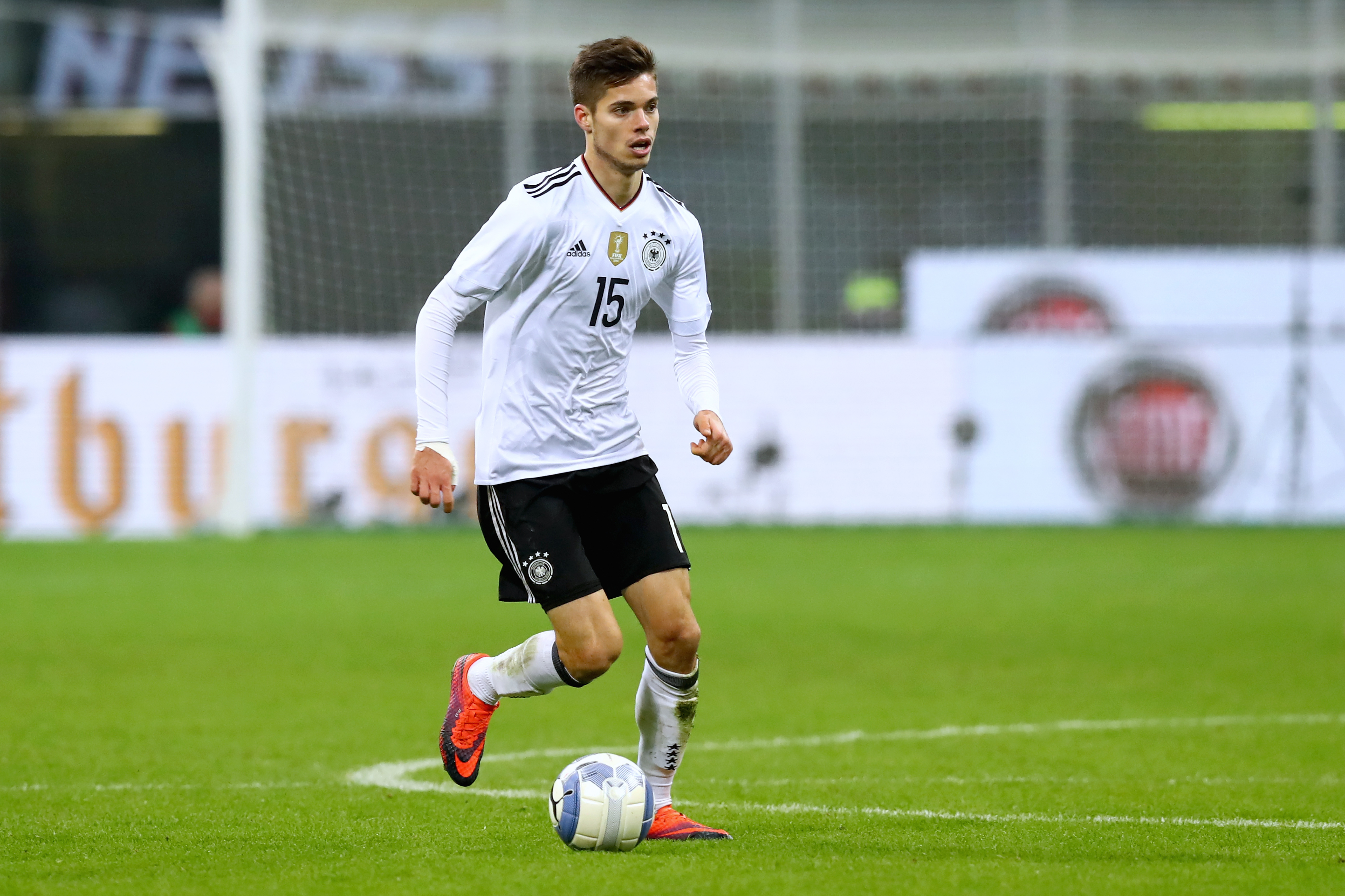 MILAN, ITALY - NOVEMBER 15:  Julian Weigl of  Germany runs with the ball during the International Friendly Match between Italy and Germany at Giuseppe Meazza Stadium on November 15, 2016 in Milan, iitaly.  (Photo by Alexander Hassenstein/Bongarts/Getty Images)