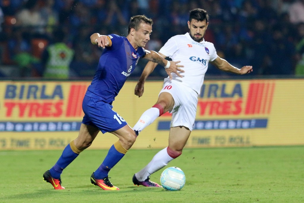 Lucian Goian of Mumbai City FC and Bruno Augusto Pelissari De Lima of Delhi Dynamos FC in action during match 55 of the Indian Super League (ISL) season 3 between Mumbai City FC and Delhi Dynamos FC held at the Mumbai Football Arena in Mumbai, India on the 3rd December 2016. Photo by Vipin Pawar / ISL / SPORTZPICS