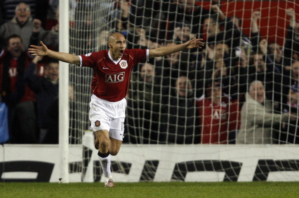 Manchester, UNITED KINGDOM: Manchester United's Swedish forward Henrik Larsson celebrates scoring against Lille during their UEFA Champions League first knockout round, second leg football match at Old Trafford, Manchester, north-west England, 07 March 2007. (Photo credit by Andrew Yates/AFP/Getty Images)