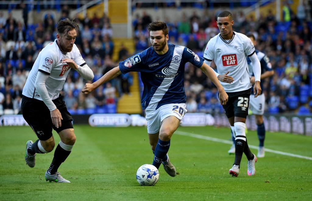 BIRMINGHAM, ENGLAND - AUGUST 21: Jon Toral of Birmingham is challenged by Richard Keogh of Derbt during the Sky Bet Championship match between Birmingham City and Derby County at St Andrews (stadium) on August 21, 2015 in Birmingham, England. (Photo by Ross Kinnaird/Getty Images)