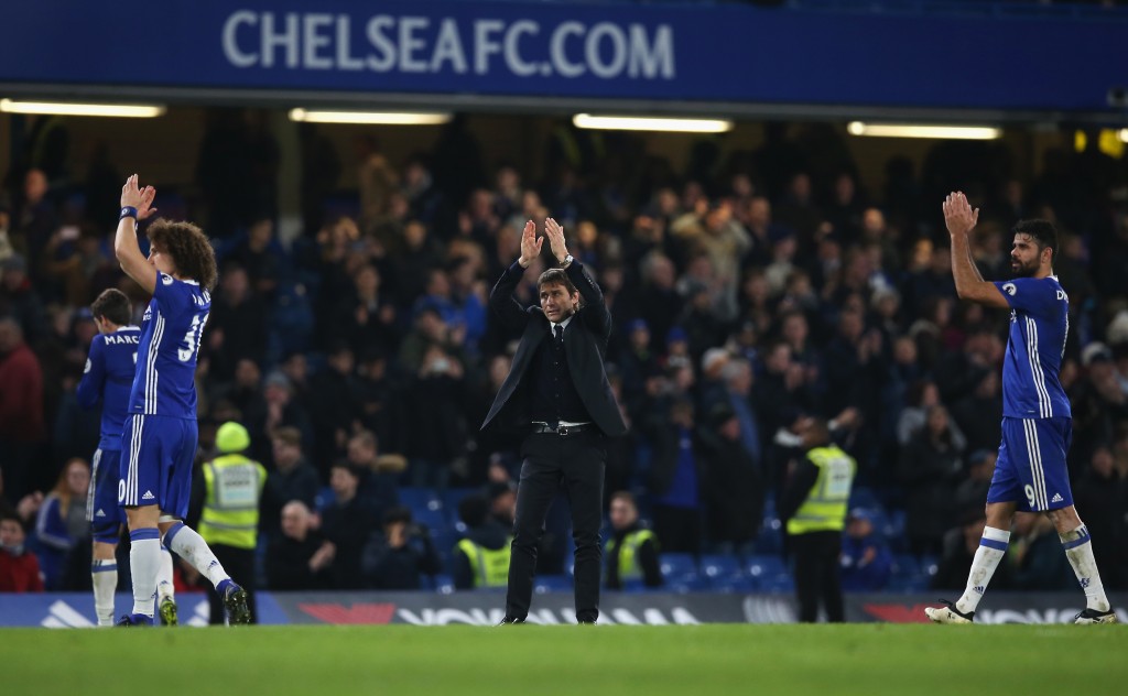 LONDON, ENGLAND - DECEMBER 31: Antonio Conte (C), Manager of Chelsea applauds supporters after the Premier League match between Chelsea and Stoke City at Stamford Bridge on December 31, 2016 in London, England. (Photo by Steve Bardens/Getty Images)