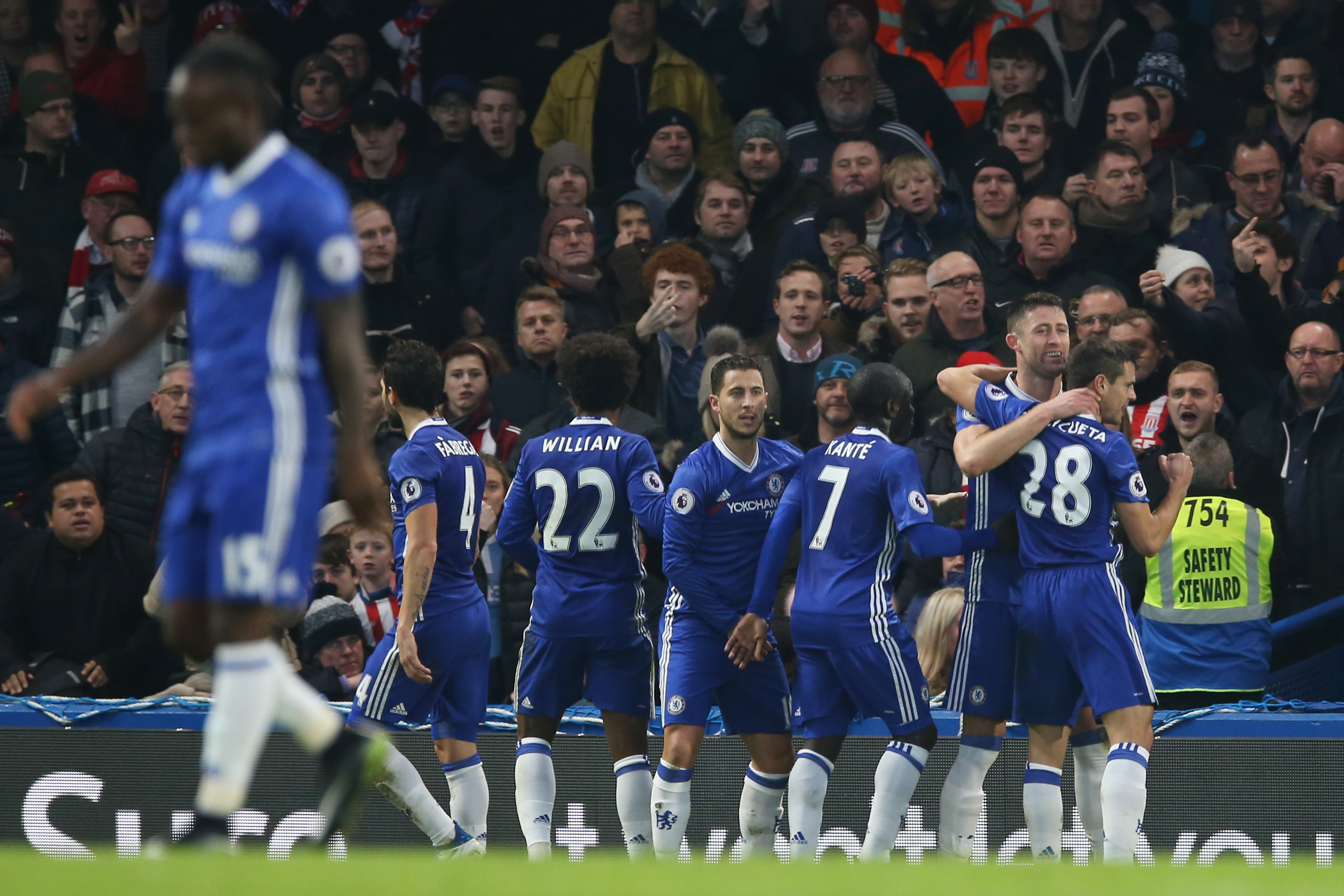 LONDON, ENGLAND - DECEMBER 31: Gary Cahill (2nd R) of Chelsea celebrates scoring the opening goal with his team mates during the Premier League match between Chelsea and Stoke City at Stamford Bridge on December 31, 2016 in London, England. (Photo by Steve Bardens/Getty Images)