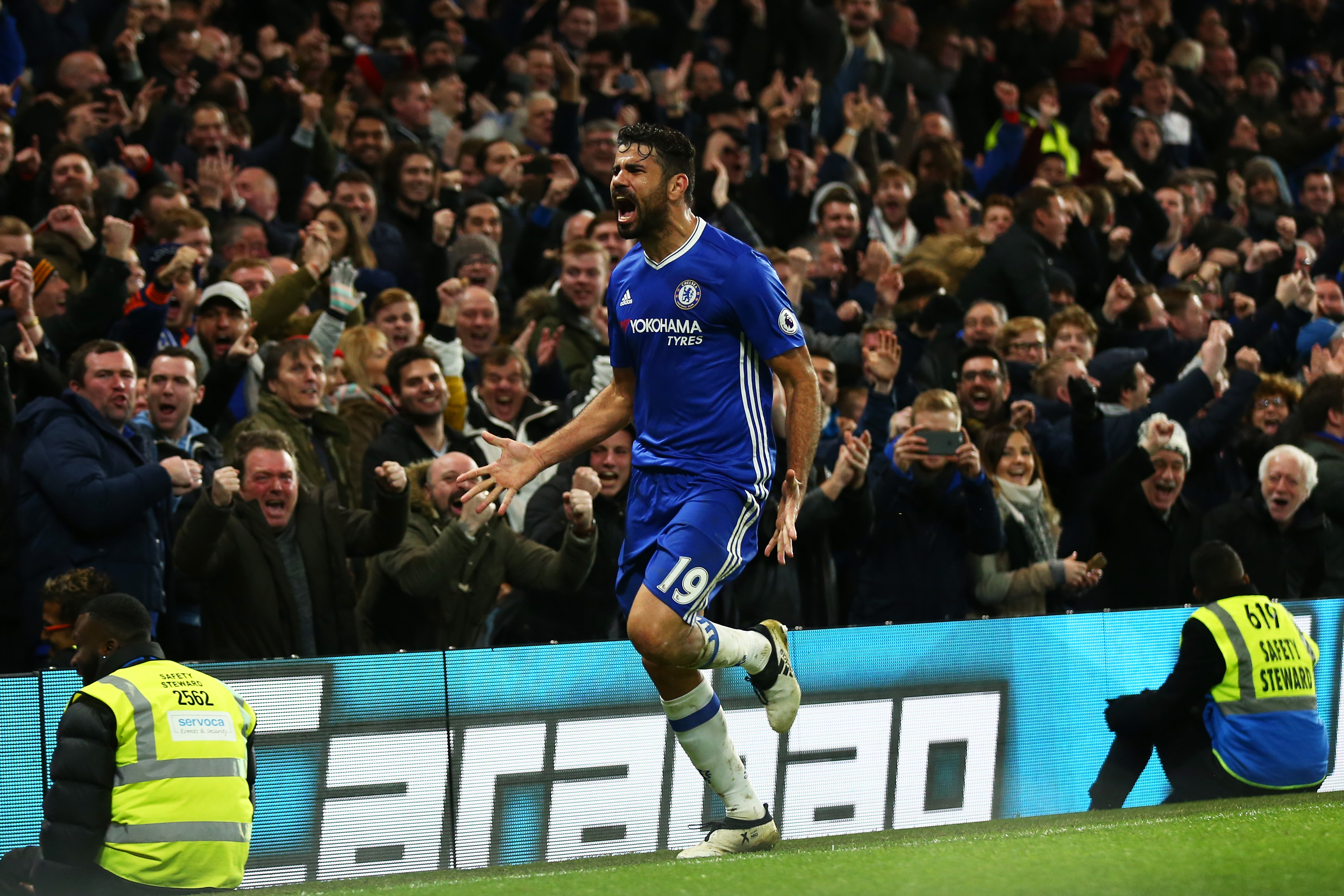 LONDON, ENGLAND - DECEMBER 31:  Diego Costa of Chelsea celebrates scoring his team's fourth goal during the Premier League match between Chelsea and Stoke City at Stamford Bridge on December 31, 2016 in London, England.  (Photo by Steve Bardens/Getty Images)
