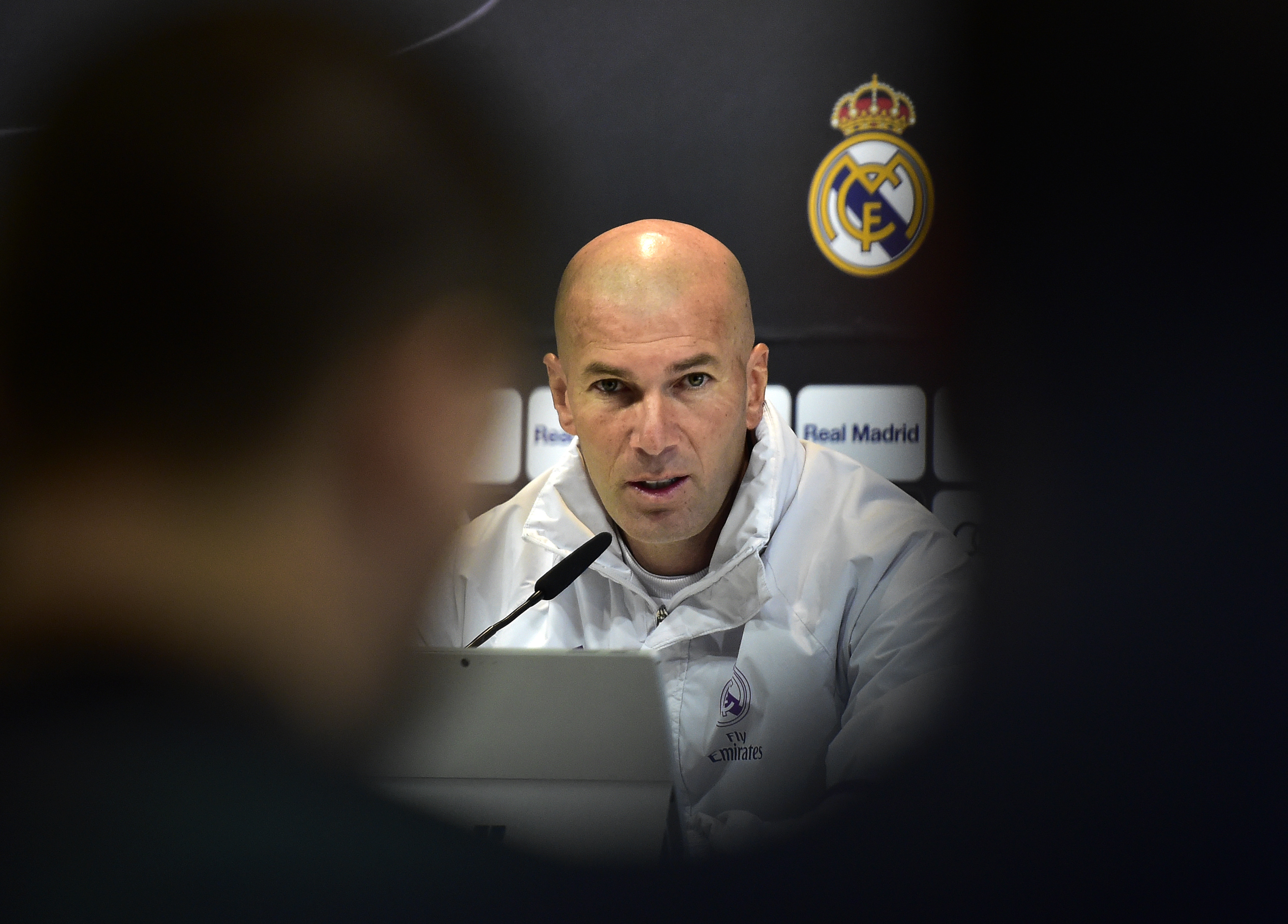 Real Madrid's French coach Zinedine Zidane speaks during a press conference at Valdebebas Sport City in Madrid on January 3, 2017, on the eve of the Spanish Copa del Rey (King's Cup) match Real Madrid CF vs Sevilla FC. / AFP / GERARD JULIEN (Photo credit should read GERARD JULIEN/AFP/Getty Images)