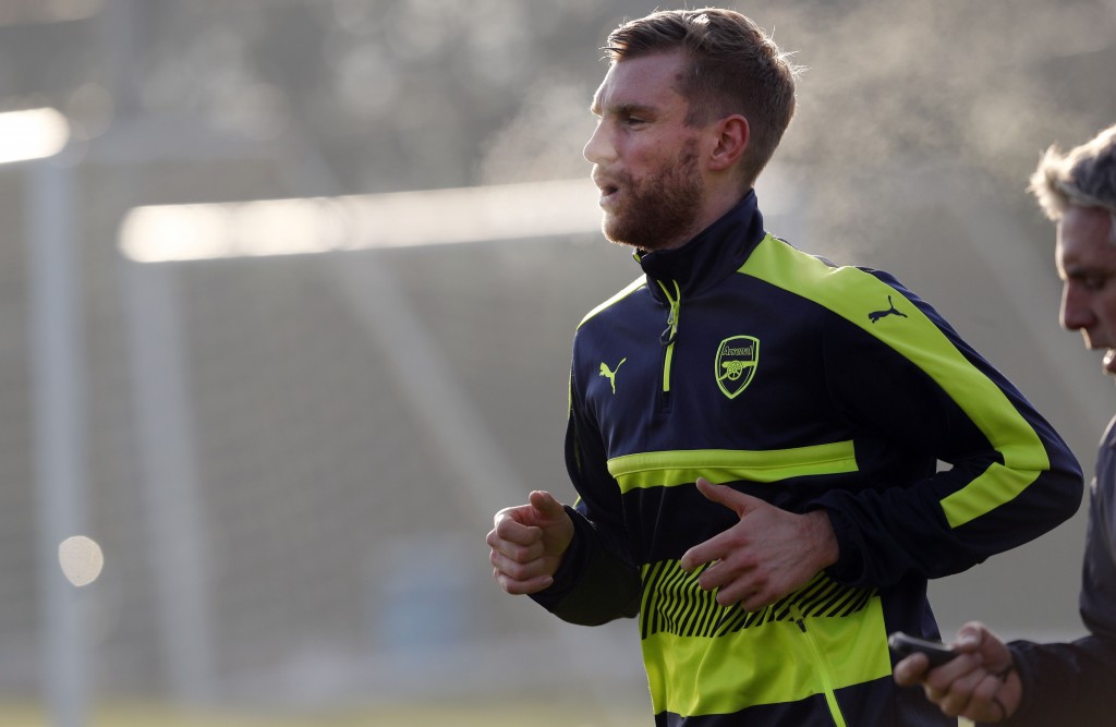 2016/17 has been a difficult season for Arsenal captain Per Mertesacker. (Photo courtesy - Adrian Dennis/AFP/Getty Images)