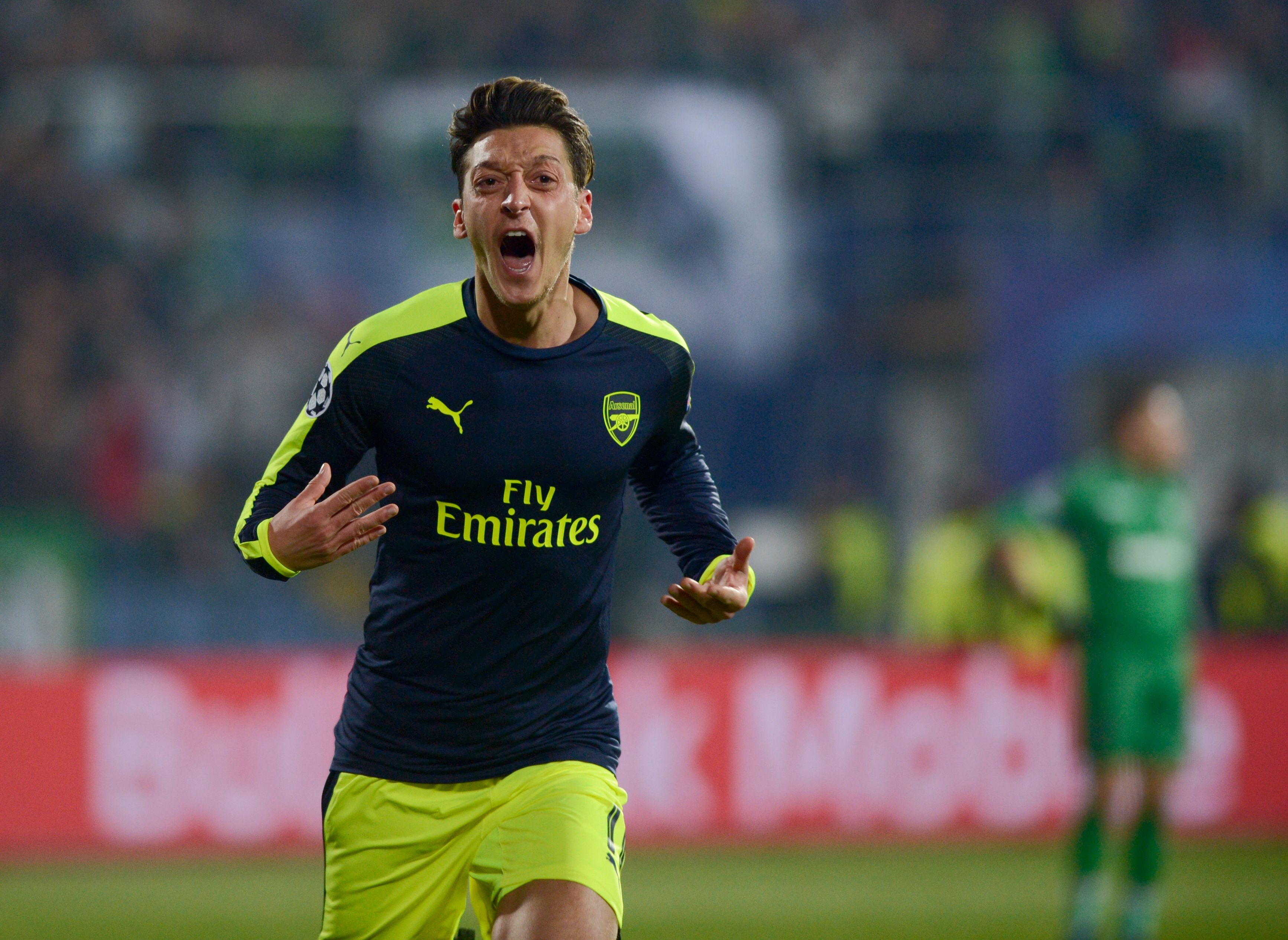 Arsenals German midfielder Mesut Ozil celebrates after scoring a goal during the UEFA Champions League Group A football match between PFC Ludogorets and Arsenal, on November 1, 2016 at the Vassil Levski stadium in Sofia. / AFP / NIKOLAY DOYCHINOV (Photo credit should read NIKOLAY DOYCHINOV/AFP/Getty Images)