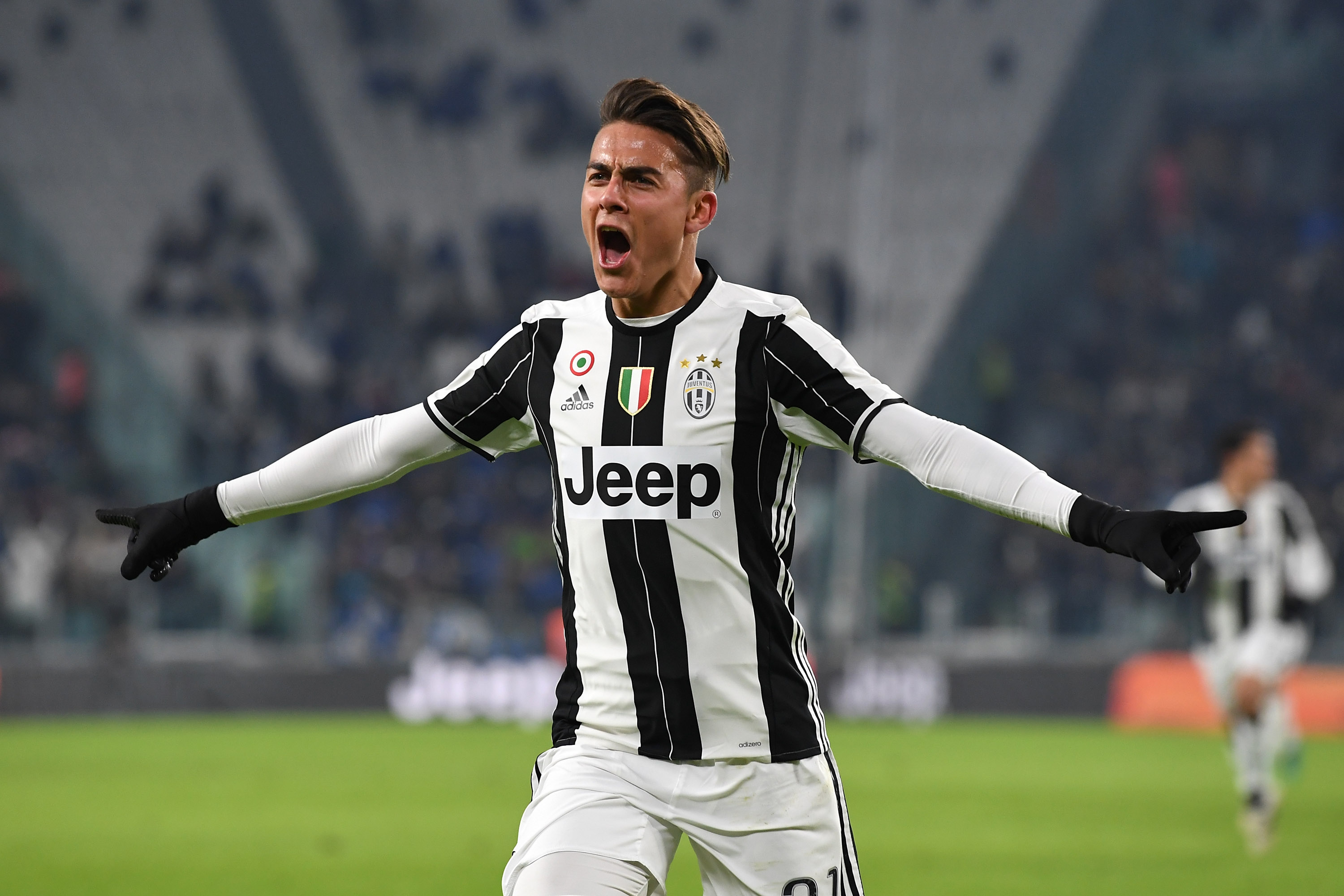 TURIN, ITALY - JANUARY 11: Paulo Dybala of FC Juventus celebrates after scoring the opening goal during the TIM Cup match between FC Juventus and Atalanta BC at Juventus Stadium on January 11, 2017 in Turin, Italy. (Photo by Valerio Pennicino/Getty Images)