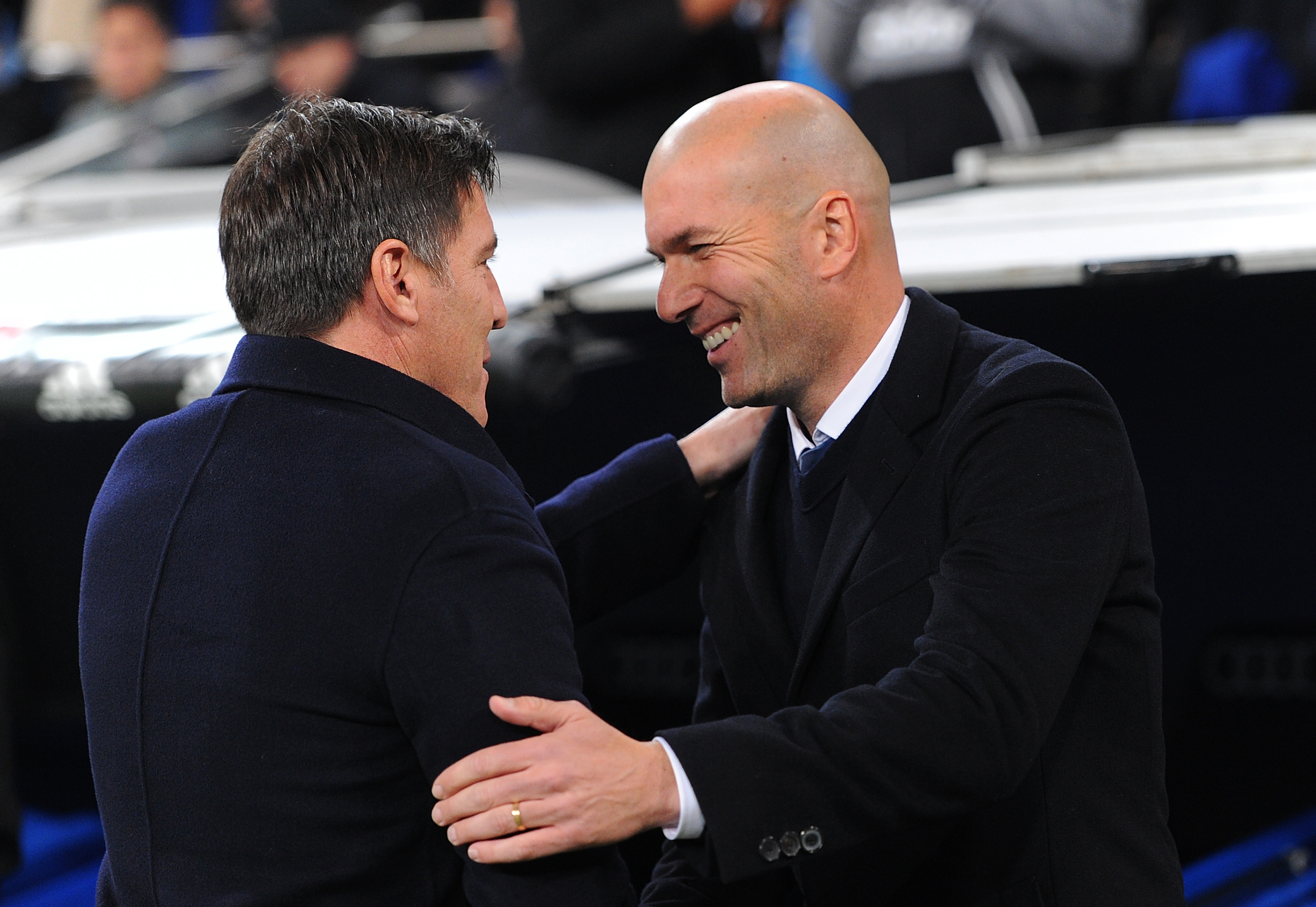 MADRID, SPAIN - JANUARY 18:  Real Madrid manager Zinedine Zidane greets Eduardo Berizzo manager of Celta de Vigo before the start of the Copa del Rey Quarter Final, First Leg match between Real Madrid CF and Celta Vigo at Bernabeu on January 18, 2017 in Madrid, Spain.  (Photo by Denis Doyle/Getty Images)