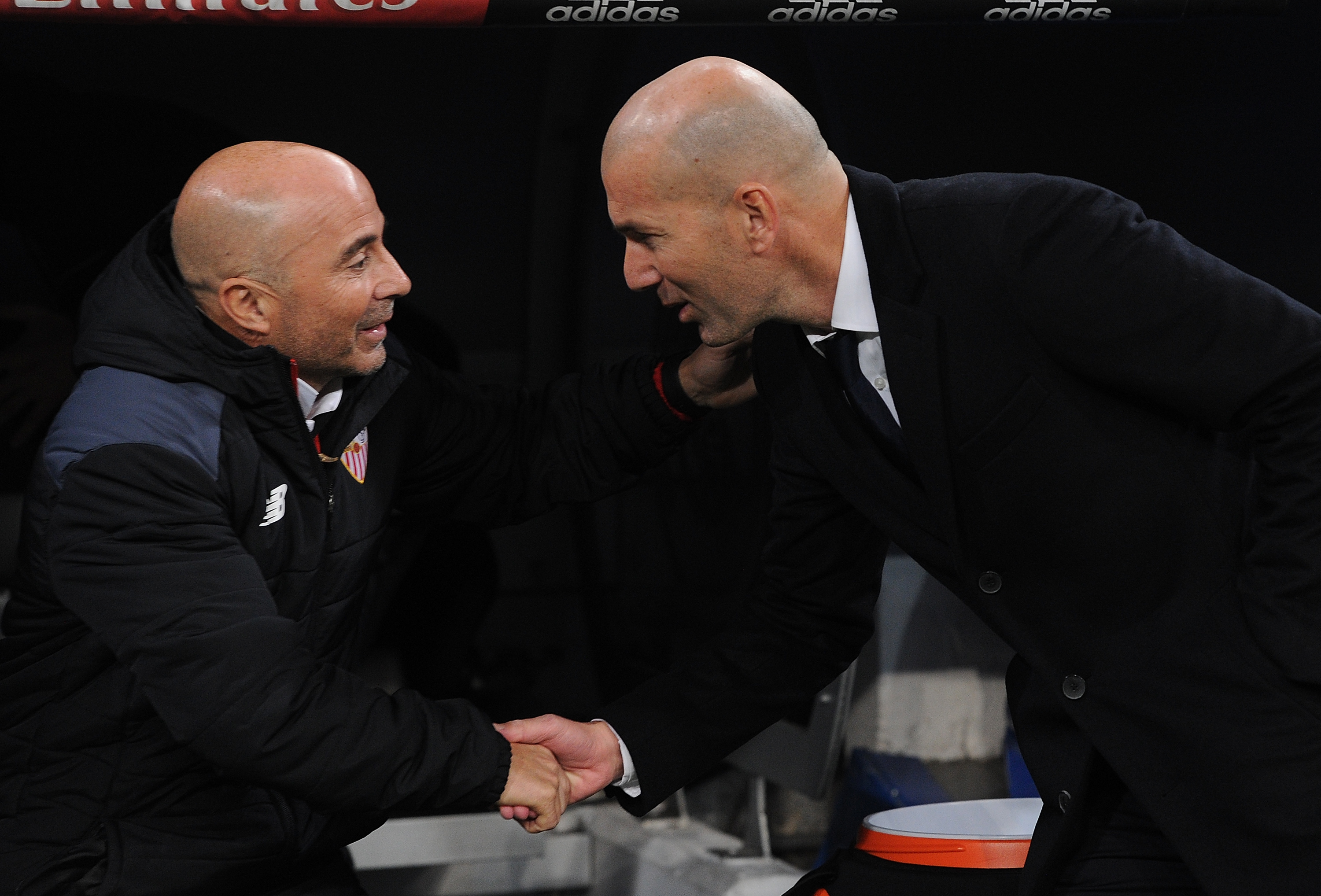 MADRID, SPAIN - JANUARY 04: Real Madrid manager Zinedine Zidane greets Sevilla FC manager Jorge Sampaoli during the Copa del Rey Round of 16 First Leg match between Real Madrid and Sevilla at Bernabeu on January 4, 2017 in Madrid, Spain. (Photo by Denis Doyle/Getty Images)