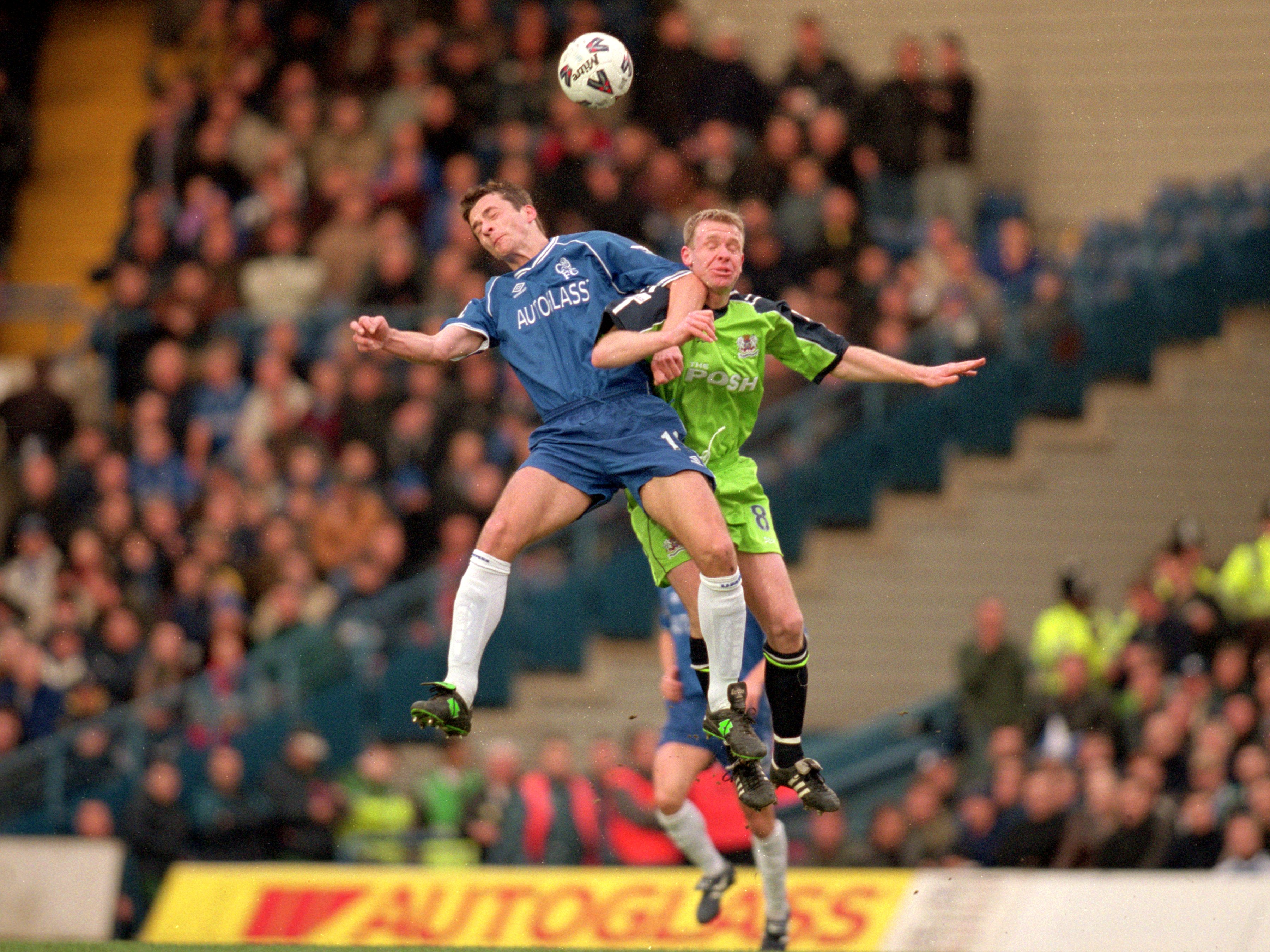 6 Jan 2001: Slavisa Jokanovic of Chelsea battles with David Oldfield of Peterborough during the AXA sponsored FA Cup Third Round match played at Stamford Bridge in London. Chelsea won the game 5-0. Picture by Steve Bardens. Mandatory Credit: AllsportUK /Allsport