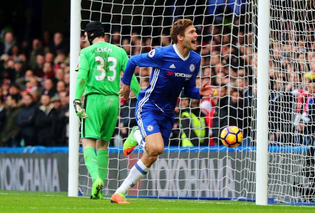 LONDON, ENGLAND - FEBRUARY 04: Marcos Alonso of Chelsea celebrates after scoring the opening goal during the Premier League match between Chelsea and Arsenal at Stamford Bridge on February 4, 2017 in London, England. (Photo by Clive Rose/Getty Images)