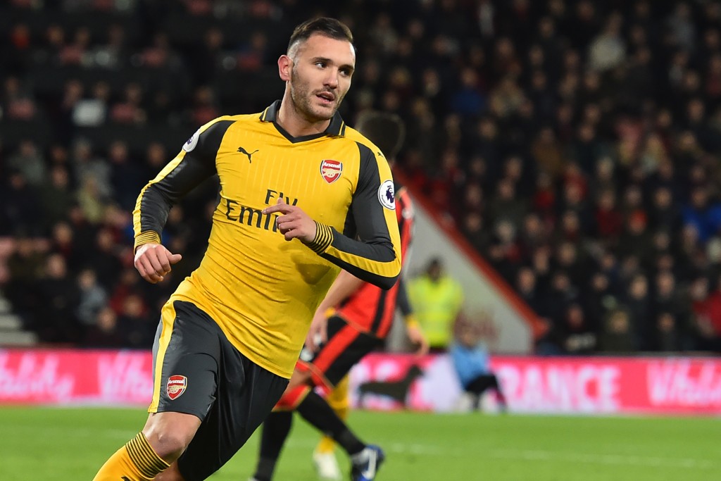 Arsenal's Spanish striker Lucas Perez celebrates after scoring their second goal during the English Premier League football match between Bournemouth and Arsenal at the Vitality Stadium in Bournemouth, southern England on January 3, 2017. / AFP / Glyn KIRK / RESTRICTED TO EDITORIAL USE. No use with unauthorized audio, video, data, fixture lists, club/league logos or 'live' services. Online in-match use limited to 75 images, no video emulation. No use in betting, games or single club/league/player publications. / (Photo credit should read GLYN KIRK/AFP/Getty Images)