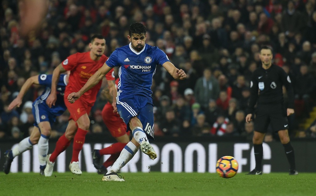 Chelsea's Brazilian-born Spanish striker Diego Costa takes a penalty but fails to score during the English Premier League football match between Liverpool and Chelsea at Anfield in Liverpool, north west England on January 31, 2017. The match ended in a draw at 1-1. / AFP / Paul ELLIS / RESTRICTED TO EDITORIAL USE. No use with unauthorized audio, video, data, fixture lists, club/league logos or 'live' services. Online in-match use limited to 75 images, no video emulation. No use in betting, games or single club/league/player publications. / The erroneous mention[s] appearing in the metadata of this photo by PAUL ELLIS has been modified in AFP systems in the following manner: [Chelsea's Brazilian-born Spanish striker Diego Costa makes a run on goal] instead of [Chelsea's Brazilian-born Spanish striker Diego Costa takes a penalty]. Please immediately remove the erroneous mention[s] from all your online services and delete it (them) from your servers. If you have been authorized by AFP to distribute it (them) to third parties, please ensure that the same actions are carried out by them. Failure to promptly comply with these instructions will entail liability on your part for any continued or post notification usage. Therefore we thank you very much for all your attention and prompt action. We are sorry for the inconvenience this notification may cause and remain at your disposal for any further information you may require. (Photo credit should read PAUL ELLIS/AFP/Getty Images)