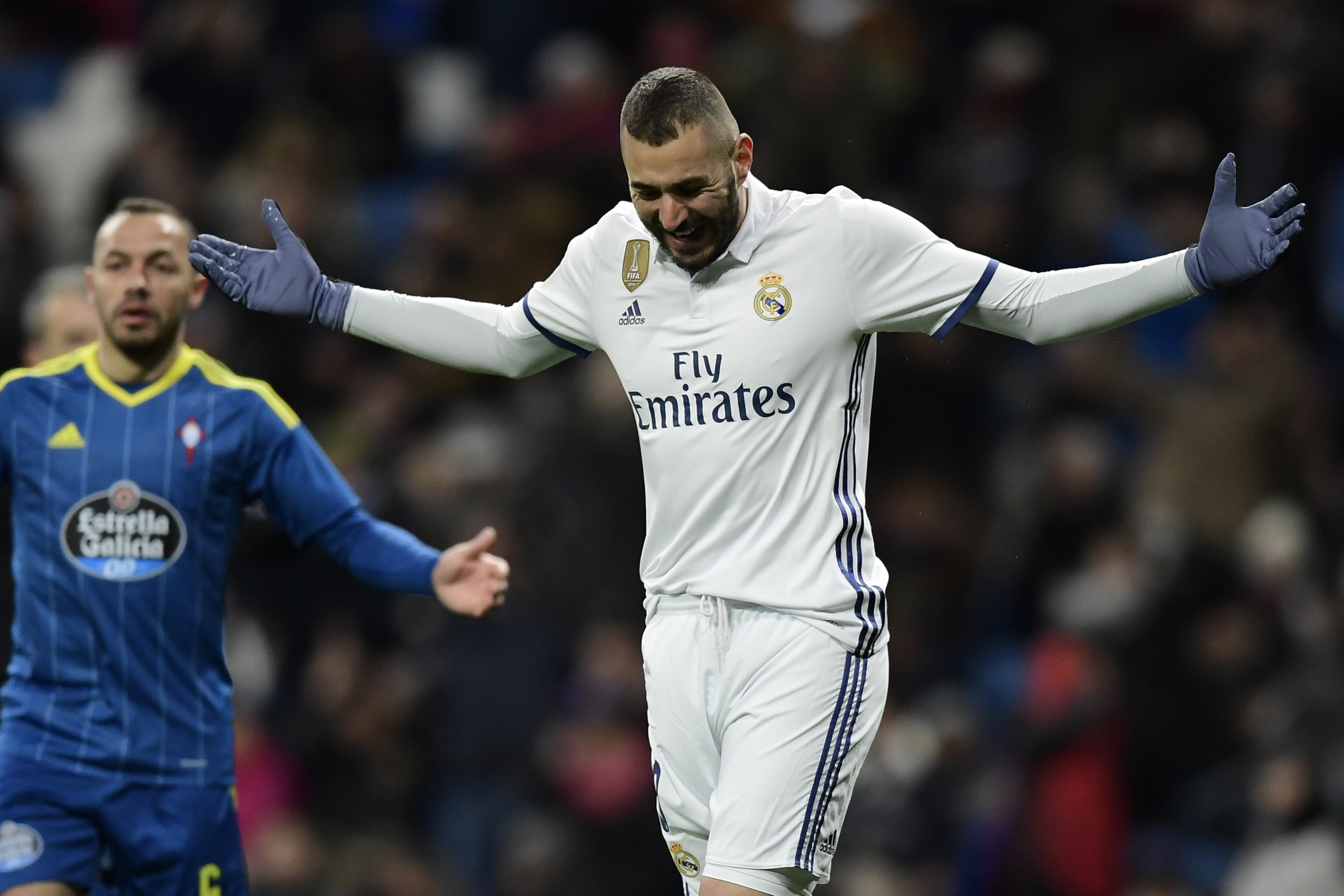 Real Madrid's French forward Karim Benzema gestures after missing a goal opportunity during the Spanish Copa del Rey (King's Cup) quarter-final first leg football match Real Madrid CF vs RC Celta de Vigo at the Santiago Bernabeu stadium in Madrid on January 18, 2017. / AFP / JAVIER SORIANO (Photo credit should read JAVIER SORIANO/AFP/Getty Images)