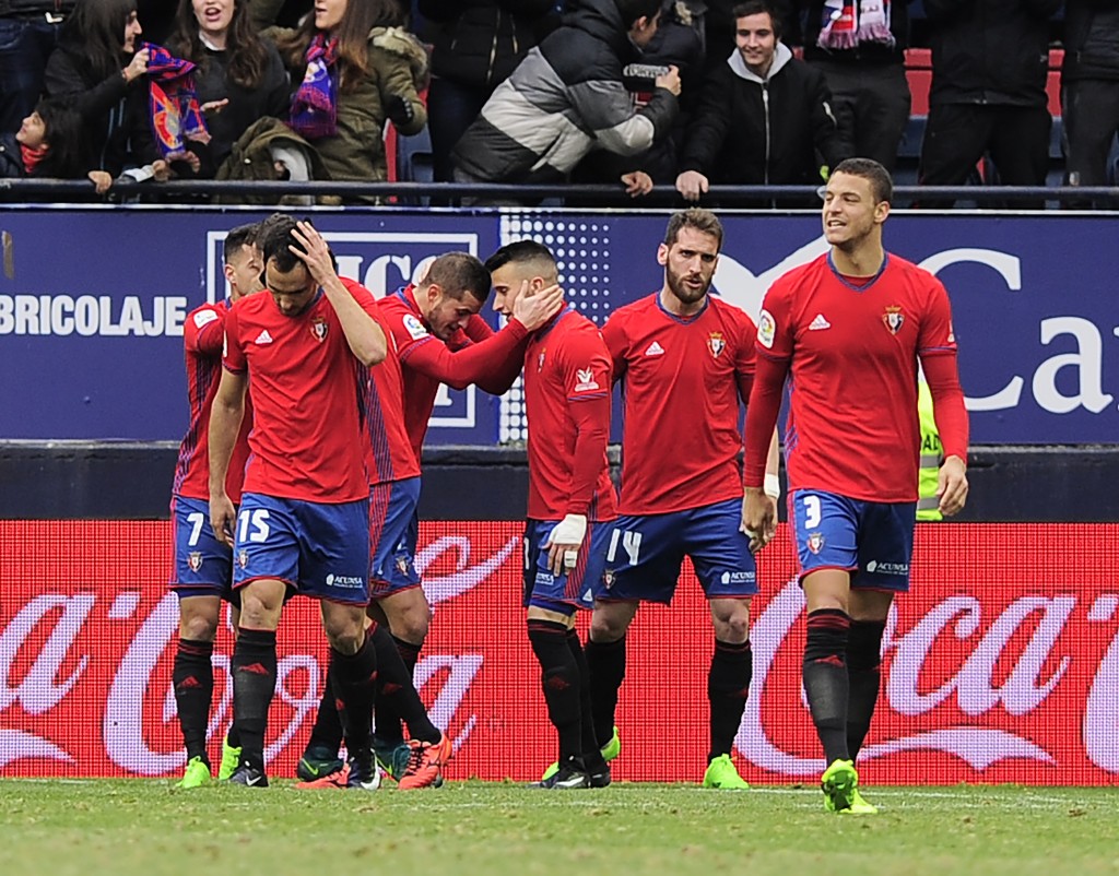 Osasuna's players celebrate after scoring their team's second goal during the Spanish league football match CA Osasuna vs Sevilla FC at El Sadar stadium in Pamplona on January 22, 2017. / AFP / ANDER GILLENEA (Photo credit should read ANDER GILLENEA/AFP/Getty Images)