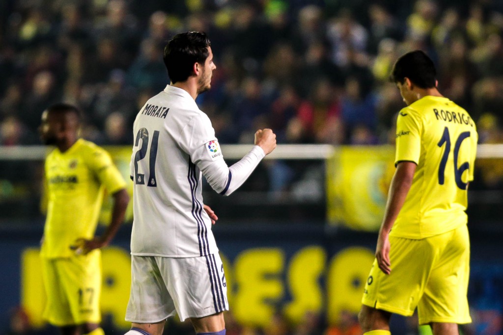 Real Madrid's forward, Alvaro Morata, celebrates after scoring a goal during the Spanish League football match Villarreal CF vs Real Madrid at El Madrigal stadium in Vila-real on February 26, 2017. / AFP / BIEL ALINO (Photo credit should read BIEL ALINO/AFP/Getty Images)
