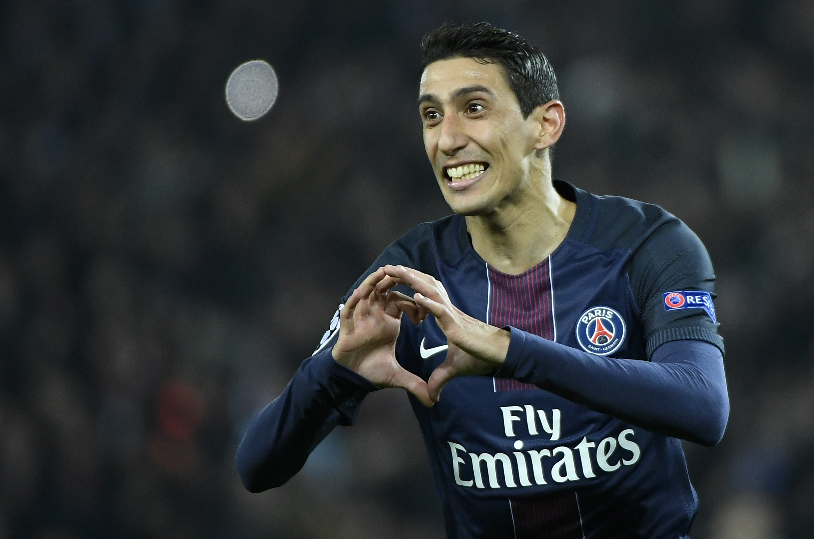 Paris Saint-Germain's Argentinian forward Angel Di Maria celebrates after scoring a goal during the UEFA Champions League round of 16 first leg football match between Paris Saint-Germain and FC Barcelona on February 14, 2017 at the Parc des Princes stadium in Paris. / AFP / Lionel BONAVENTURE (Photo credit should read LIONEL BONAVENTURE/AFP/Getty Images)