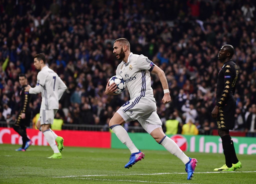 Real Madrid's French forward Karim Benzema (C) celebrates a goal during the UEFA Champions League round of 16 first leg football match Real Madrid CF vs SSC Napoli at the Santiago Bernabeu stadium in Madrid on February 15, 2017. / AFP / PIERRE-PHILIPPE MARCOU (Photo credit should read PIERRE-PHILIPPE MARCOU/AFP/Getty Images)