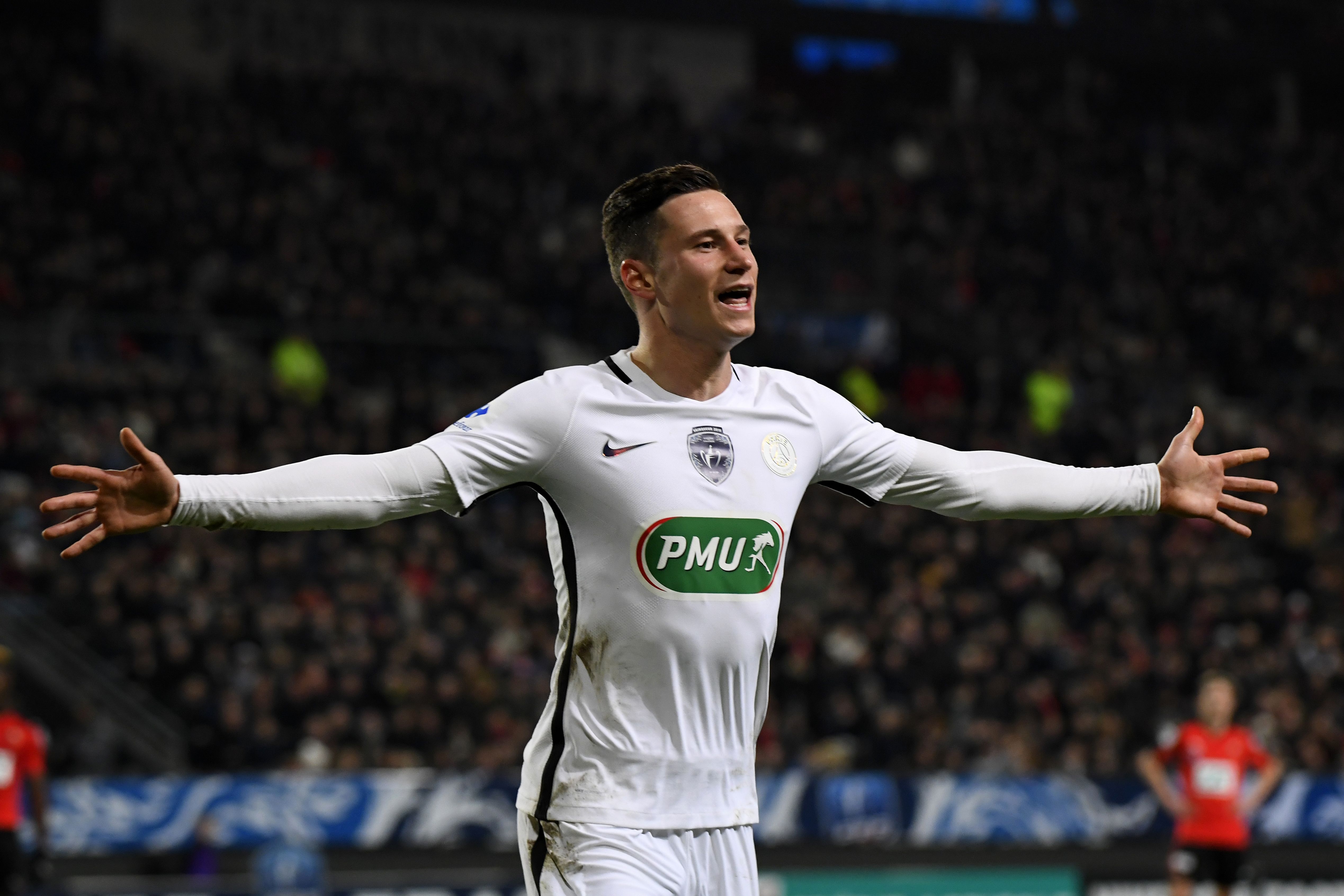 Paris Saint-Germain's German forward Julian Draxler celebrates after scoring a goal during the French Cup football match Rennes against Paris Saint Germain on February 1, 2017 at the Roahzon Park stadium in Rennes, western France. / AFP / DAMIEN MEYER (Photo credit should read DAMIEN MEYER/AFP/Getty Images)