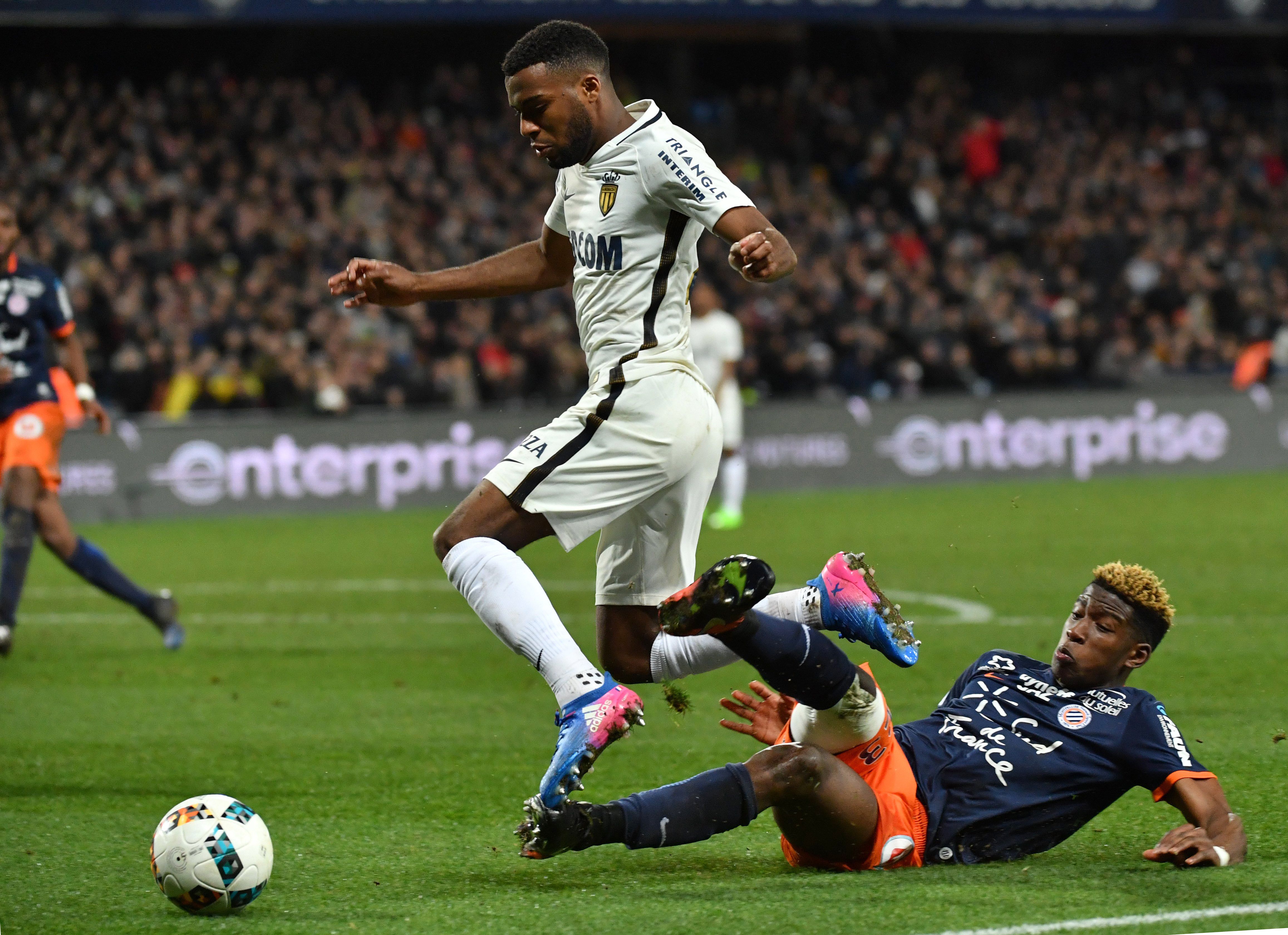Monaco's French midfielder Thomas Lemar (L) vies with Montpellier's French defender Nordi Mukiele (R) during the French L1 football match between MHSC Montpellier and Monaco, on February 7, 2017 at the La Mosson Stadium in Montpellier, southern France. / AFP / PASCAL GUYOT (Photo credit should read PASCAL GUYOT/AFP/Getty Images)
