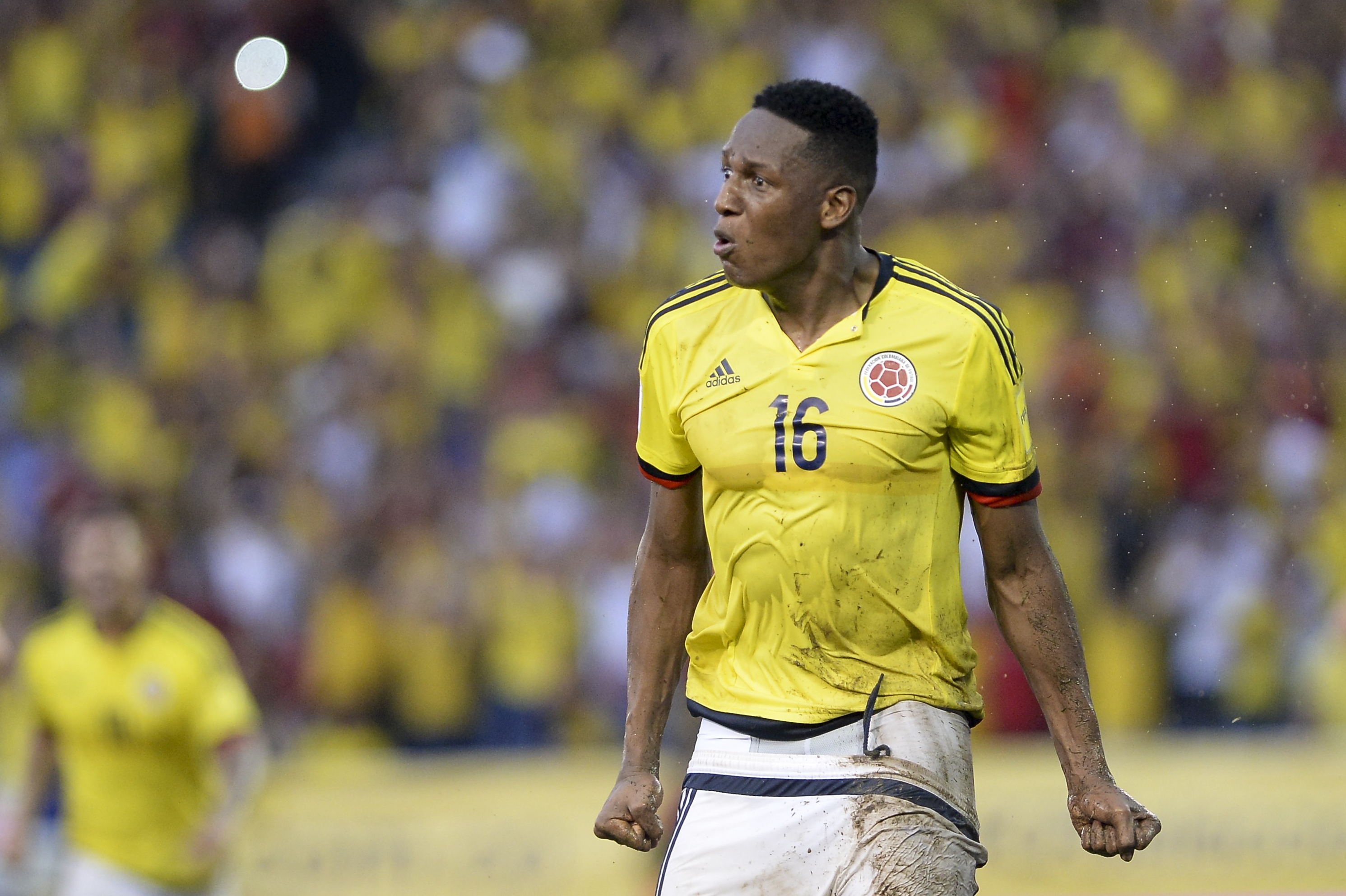 Colombia's defender Yerry Mina celebrates after scoring against Uruguay during their Russia 2018 World Cup qualifier football match in Barranquilla, Colombia, on October 11, 2016. / AFP / Raul Arboleda (Photo credit should read RAUL ARBOLEDA/AFP/Getty Images)