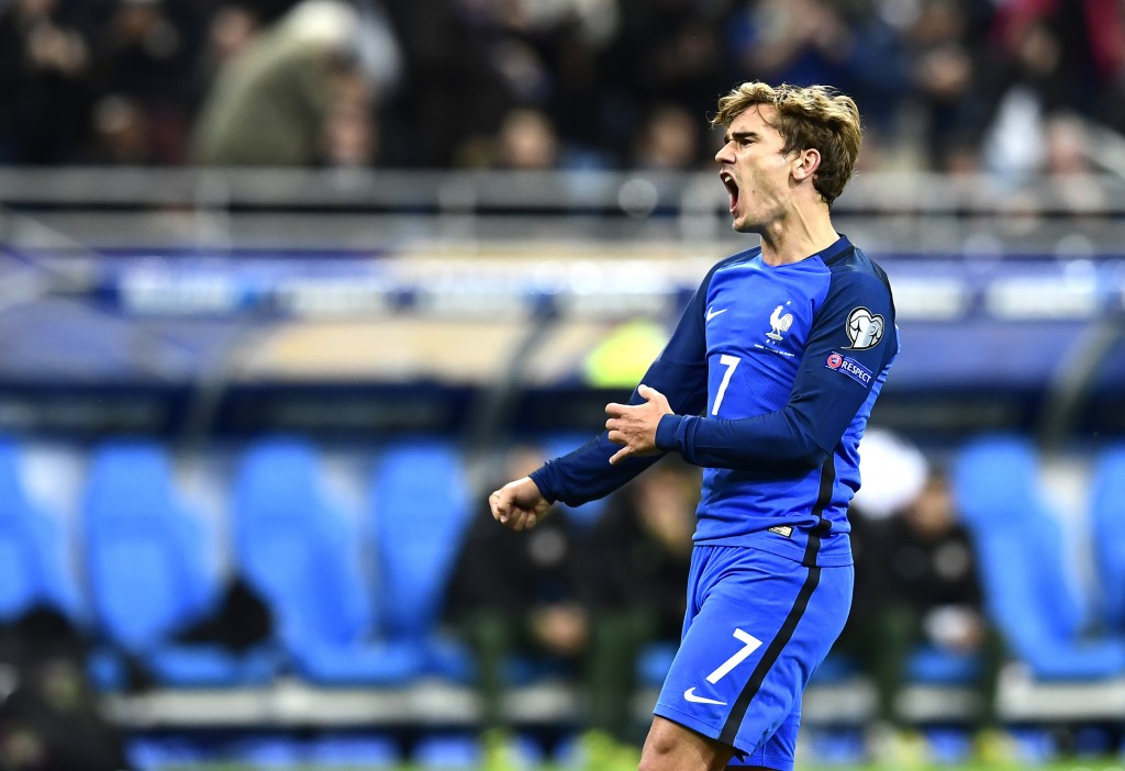 France's forward Antoine Griezmann celebrates after he scored his team's third goal during the FIFA World Cup 2018 qualifying football match France vs Bulgaria on October 7, 2016 at the Stade de France stadium in Saint-Denis, north of Paris. / AFP / MIGUEL MEDINA (Photo credit should read MIGUEL MEDINA/AFP/Getty Images)