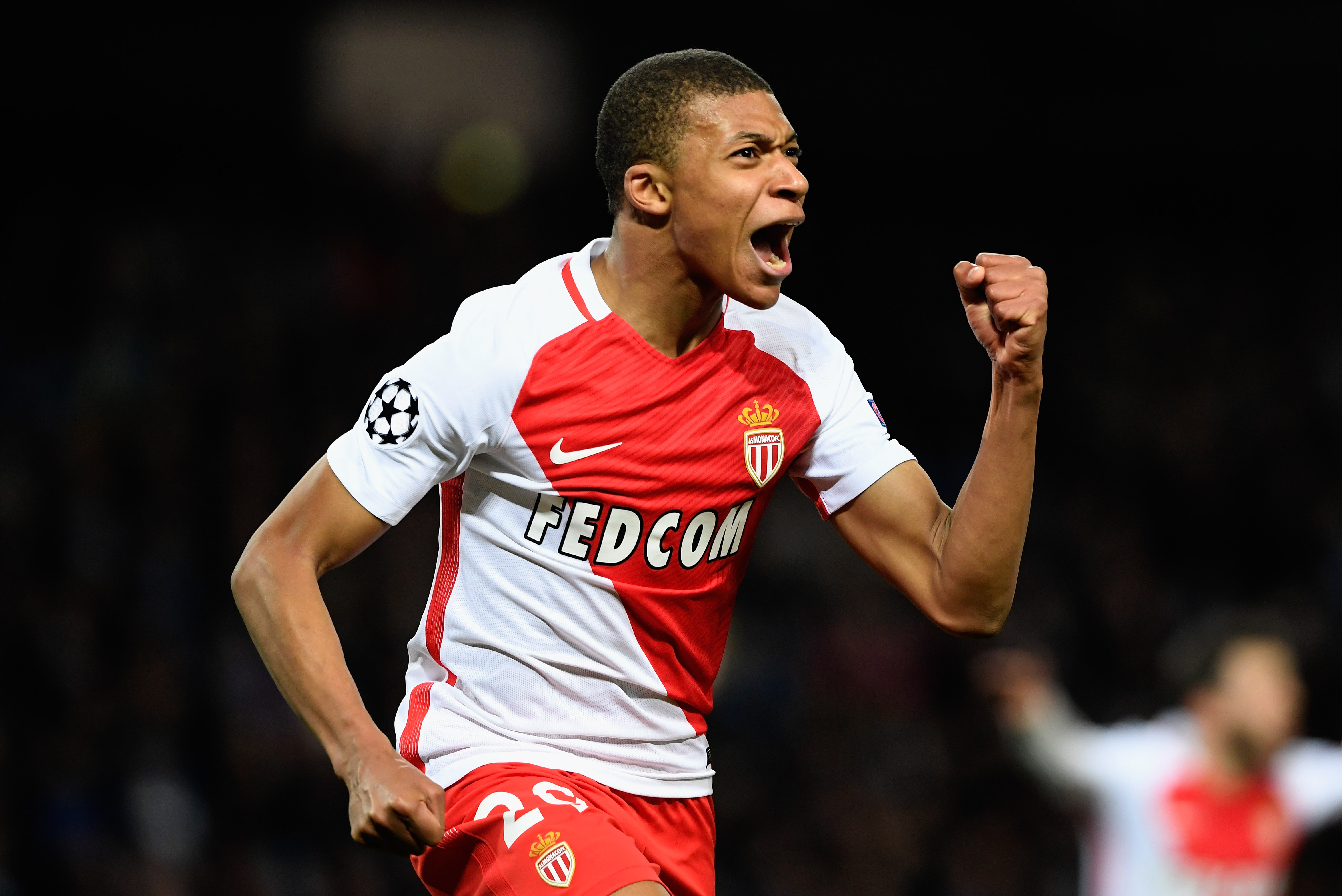 MANCHESTER, ENGLAND - FEBRUARY 21: Kylian Mbappe of AS Monaco celebrates as he scores their second goal during the UEFA Champions League Round of 16 first leg match between Manchester City FC and AS Monaco at Etihad Stadium on February 21, 2017 in Manchester, United Kingdom. (Photo by Stu Forster/Getty Images)