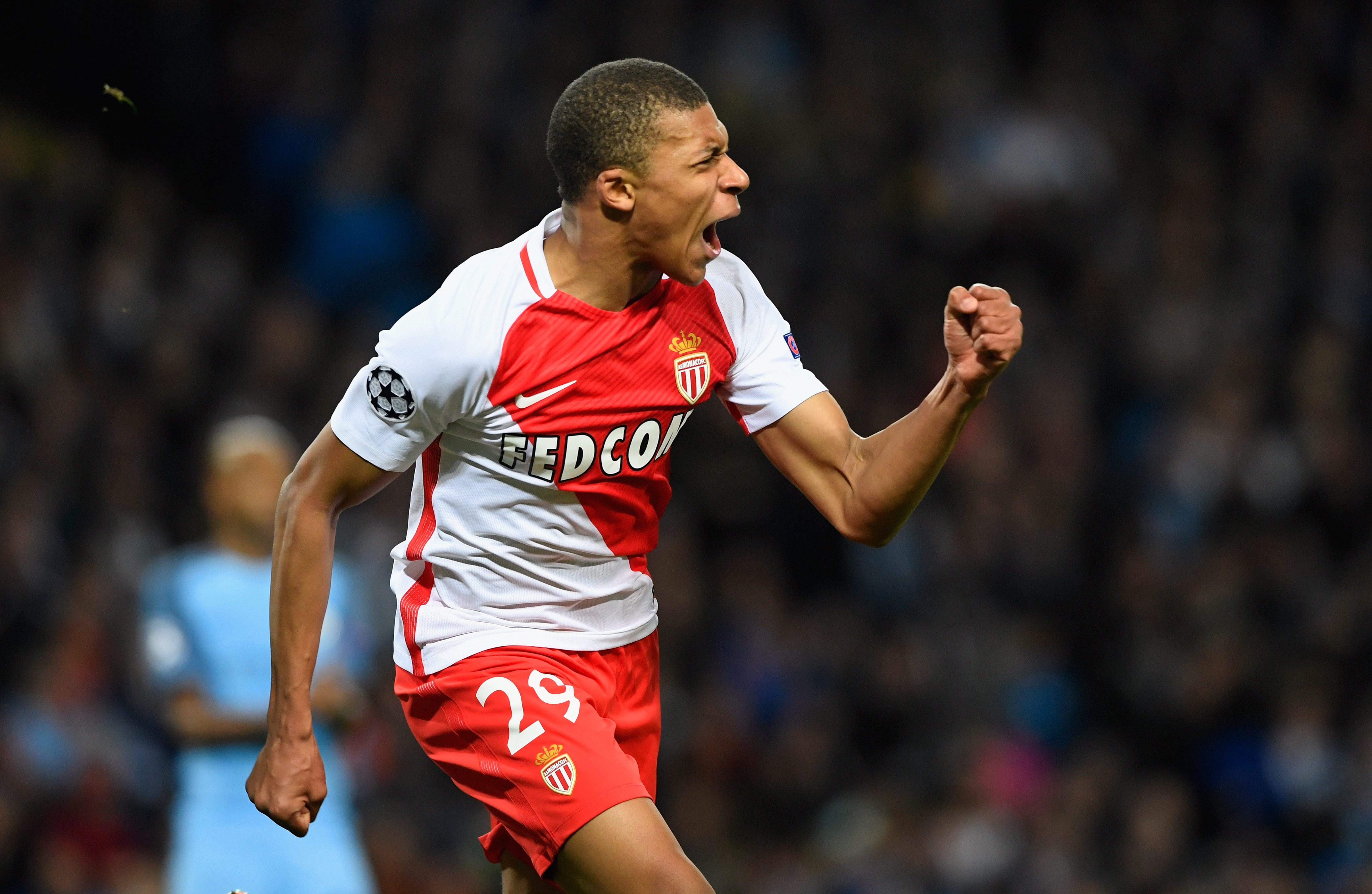 MANCHESTER, ENGLAND - FEBRUARY 21: Kylian Mbappe of AS Monaco celebrates as he scores their second goal during the UEFA Champions League Round of 16 first leg match between Manchester City FC and AS Monaco at Etihad Stadium on February 21, 2017 in Manchester, United Kingdom. (Photo by Stu Forster/Getty Images)