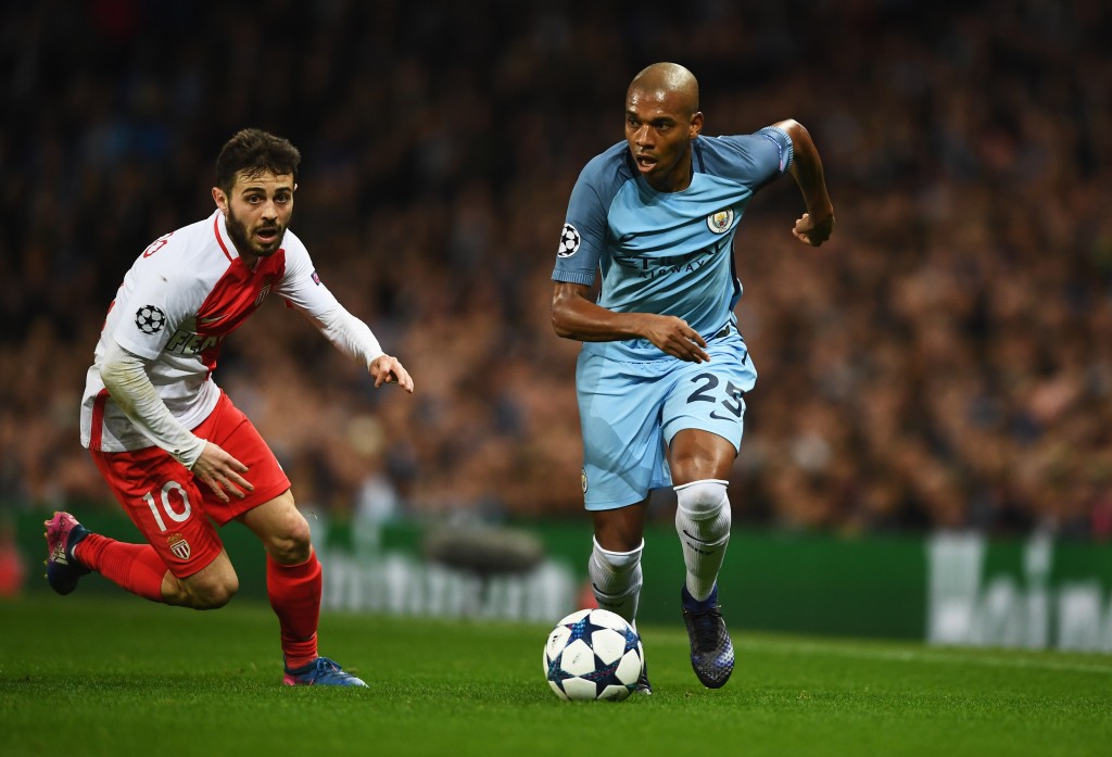 MANCHESTER, ENGLAND - FEBRUARY 21: Fernandinho of Manchester City takes on Bernardo Silva of AS Monaco during the UEFA Champions League Round of 16 first leg match between Manchester City FC and AS Monaco at Etihad Stadium on February 21, 2017 in Manchester, United Kingdom. (Photo by Laurence Griffiths/Getty Images)