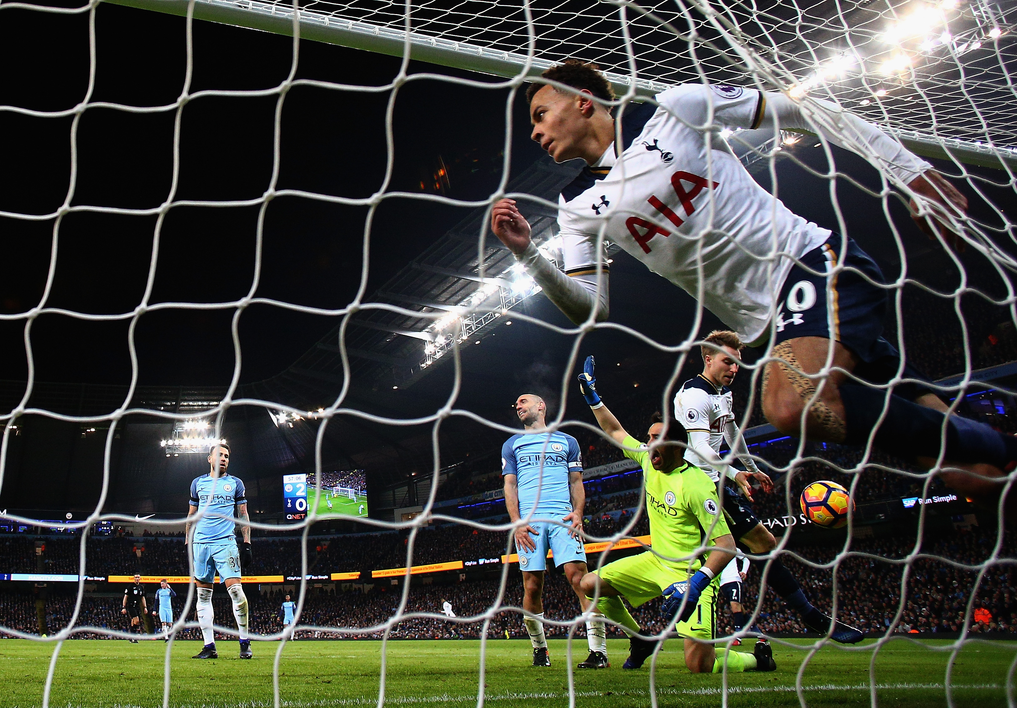 MANCHESTER, ENGLAND - JANUARY 21: Dele Alli of Tottenham Hotspur celebrates scoring his sides first goal during the Premier League match between Manchester City and Tottenham Hotspur at Etihad Stadium on January 21, 2017 in Manchester, England. (Photo by Clive Mason/Getty Images)