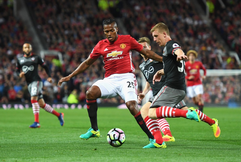 MANCHESTER, ENGLAND - AUGUST 19: Antonio Valencia of Manchester United closes down Matt Targett of Southampton during the Premier League match between Manchester United and Southampton at Old Trafford on August 19, 2016 in Manchester, England. (Photo by Michael Regan/Getty Images)