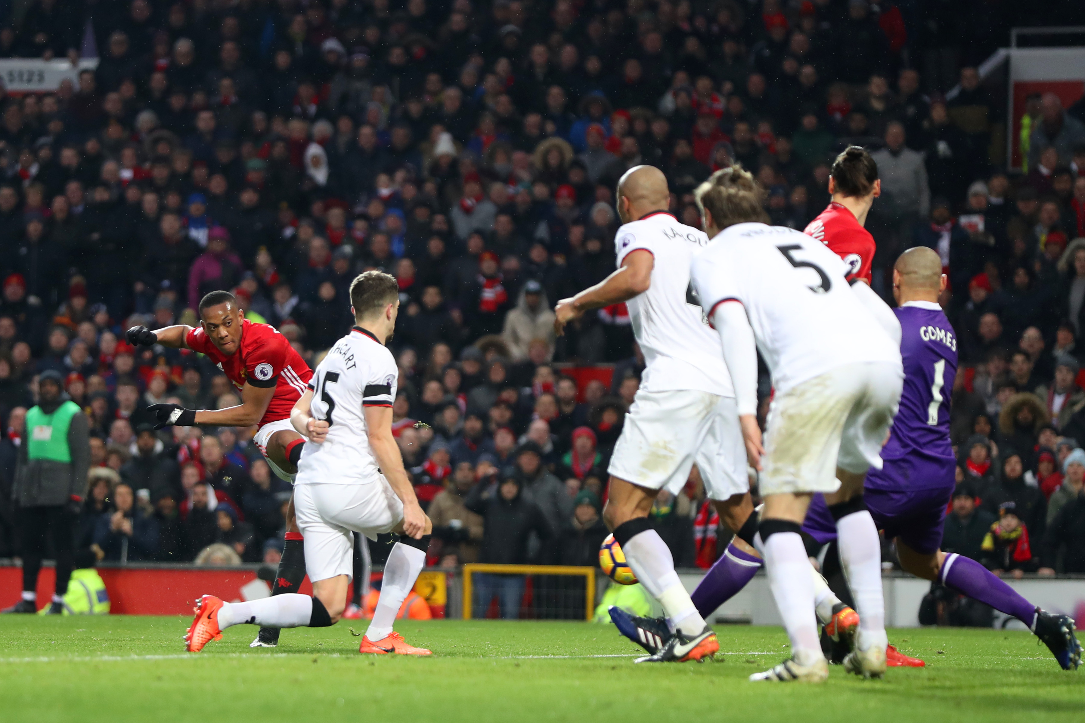 MANCHESTER, ENGLAND - FEBRUARY 11:  Anthony Martial (1st L) of Manchester United scores his side's second goal during the Premier League match between Manchester United and Watford at Old Trafford on February 11, 2017 in Manchester, England.  (Photo by Mark Thompson/Getty Images)