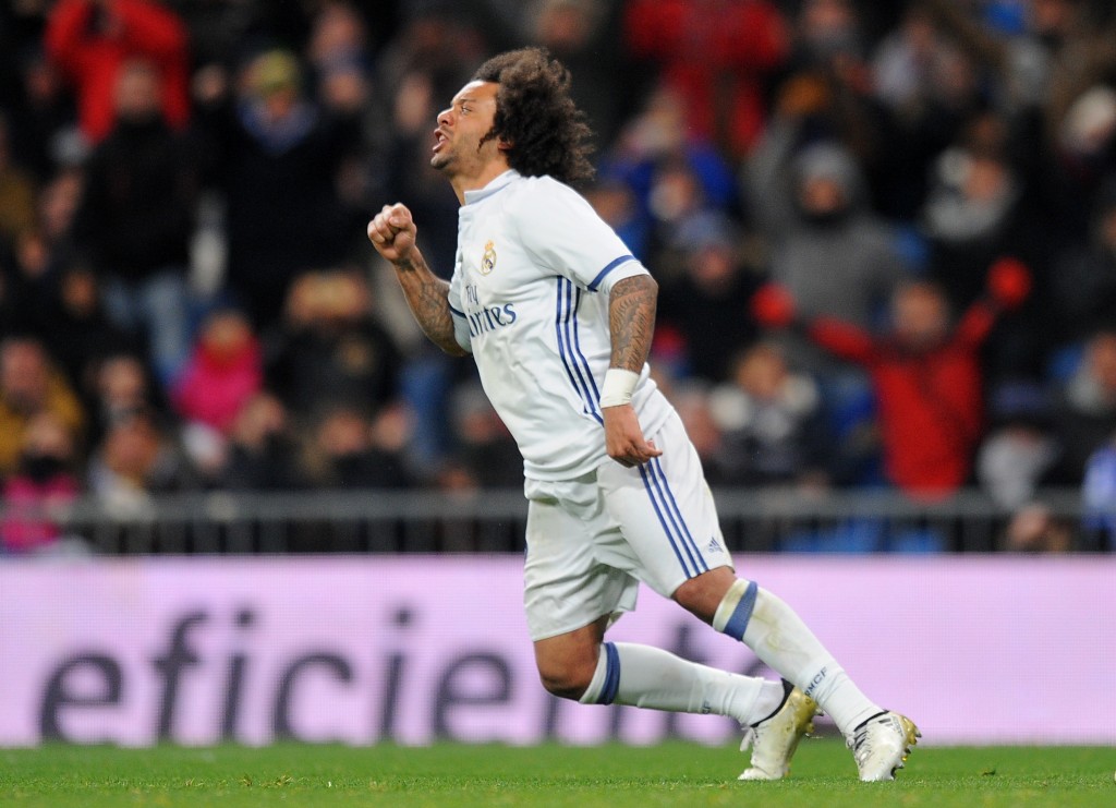 MADRID, SPAIN - JANUARY 18: Marcelo of Real Madrid reacts after scoring his team's 1st goal during the Copa del Rey Quarter Final, First Leg match between Real Madrid CF and Celta Vigo at Bernabeu on January 18, 2017 in Madrid, Spain. (Photo by Denis Doyle/Getty Images)
