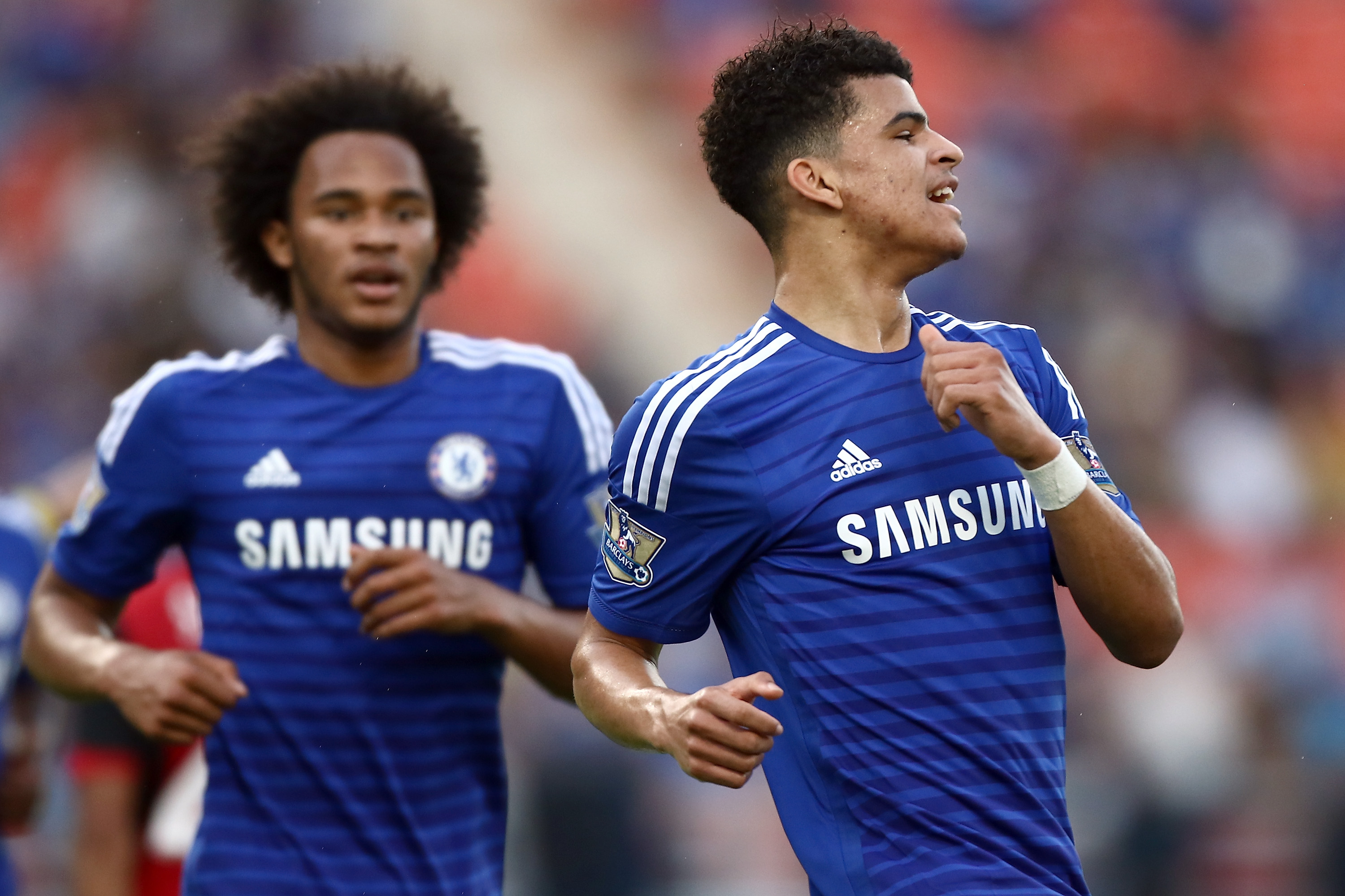 BANGKOK, THAILAND - MAY 30: Dominic Solanke (R) of Chelsea reacts after scoring against Thailand All-Stars during the international friendly match between Thailand All-Stars and Chelsea FC at Rajamangala Stadium on May 30, 2015 in Bangkok, Thailand. (Photo by Stanley Chou/Getty Images)