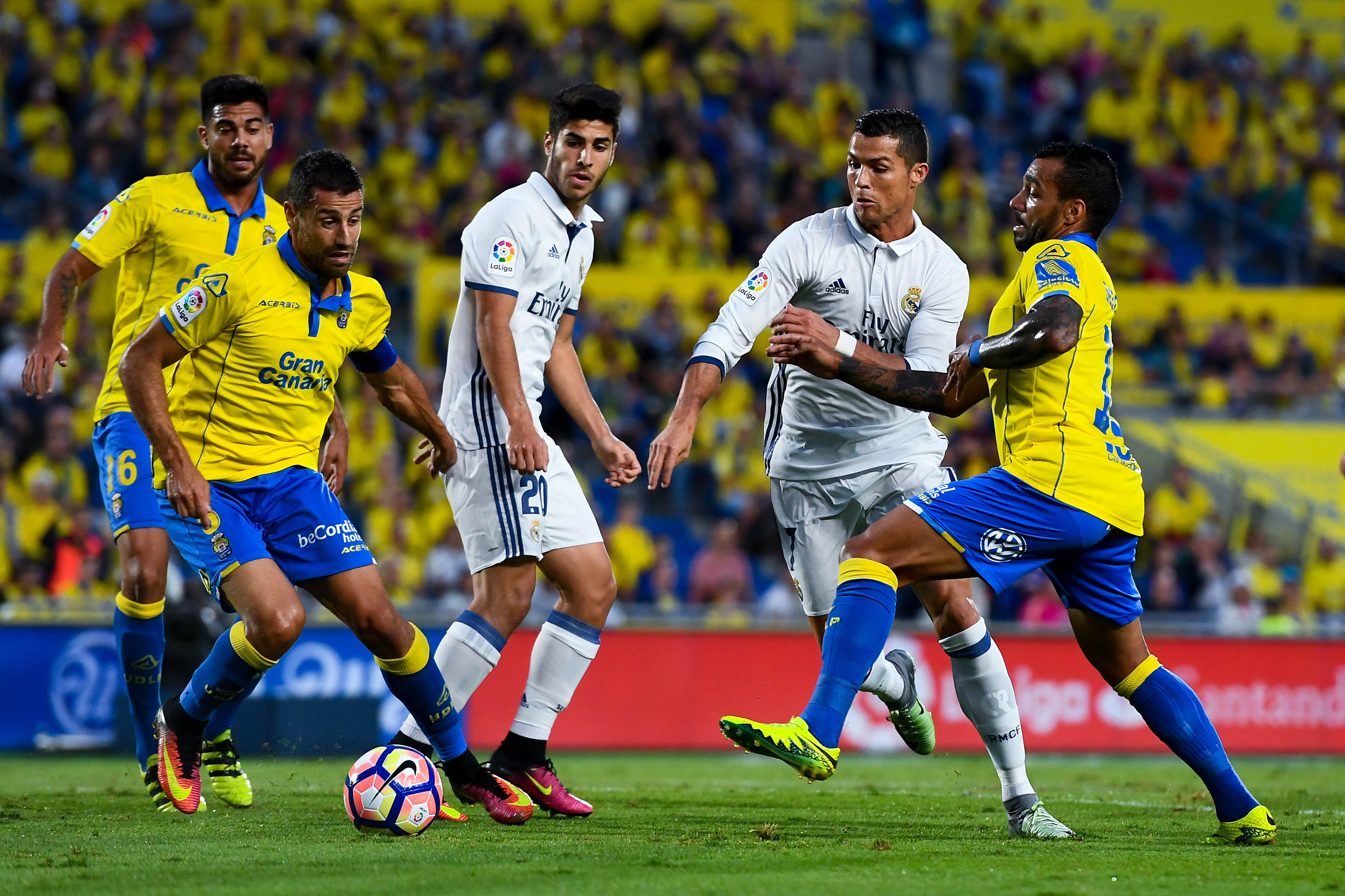 LAS PALMAS, SPAIN - SEPTEMBER 24: Cristiano Ronaldo of Real Madrid CF is brought down by Michel Macedo of UD Las Palmas during the La Liga match between UD Las Palmas and Real Madrid CF on September 24, 2016 in Las Palmas, Spain. (Photo by David Ramos/Getty Images)
