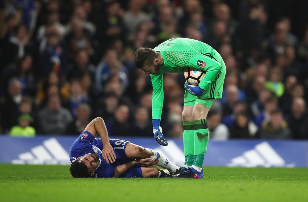 LONDON, ENGLAND - MARCH 13: David De Gea of Manchester United stands over an injured Diego Costa of Chelsea during The Emirates FA Cup Quarter-Final match between Chelsea and Manchester United at Stamford Bridge on March 13, 2017 in London, England. (Photo by Julian Finney/Getty Images)