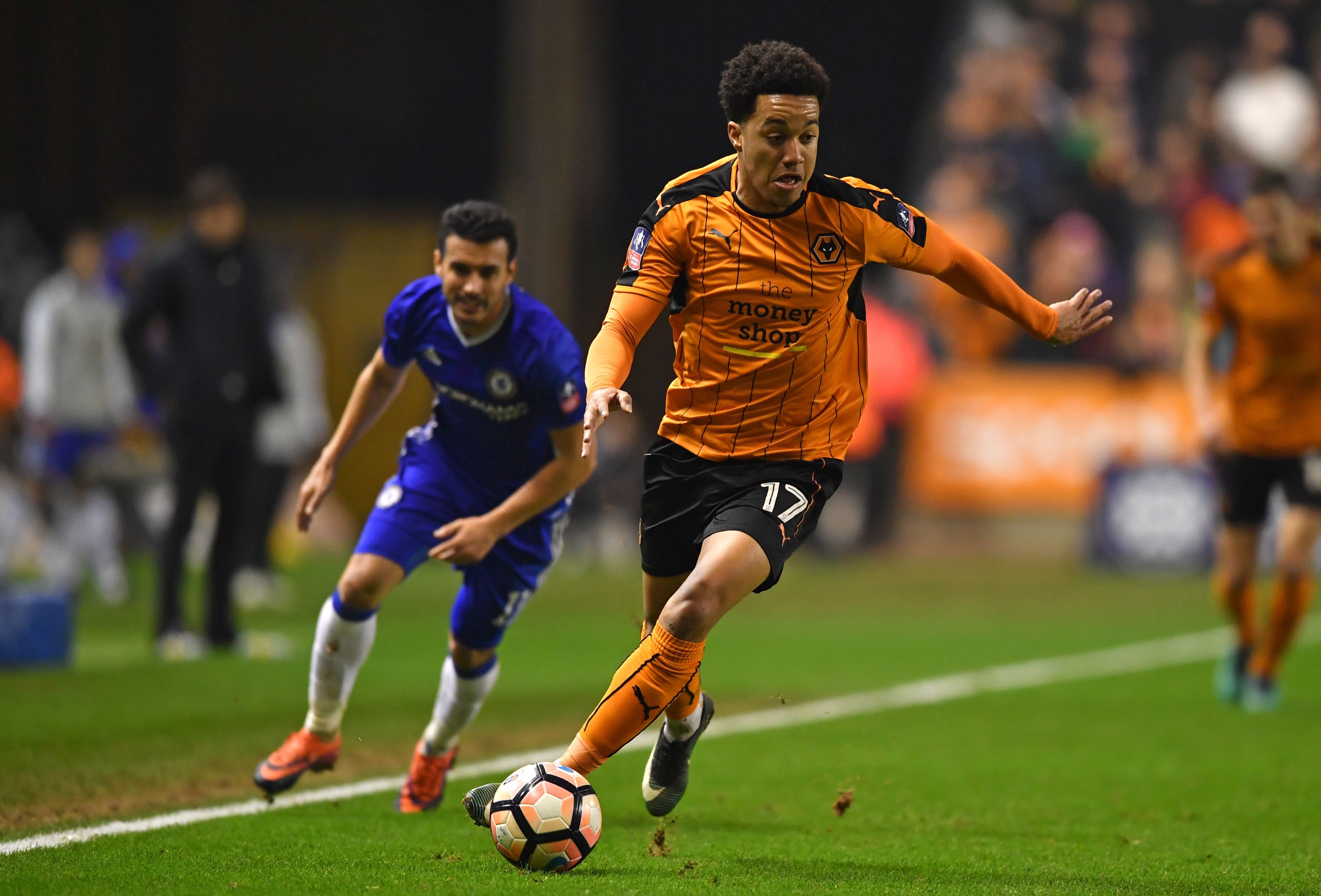 Wolverhampton Wanderers' Portuguese striker Helder Costa runs with the ball during the English FA Cup fifth round football match between Wolverhampton Wanderers and Chelsea at the Molineux stadium in Wolverhampton, central England on February 18, 2017. / AFP / Ben STANSALL / RESTRICTED TO EDITORIAL USE. No use with unauthorized audio, video, data, fixture lists, club/league logos or 'live' services. Online in-match use limited to 75 images, no video emulation. No use in betting, games or single club/league/player publications. / (Photo credit should read BEN STANSALL/AFP/Getty Images)