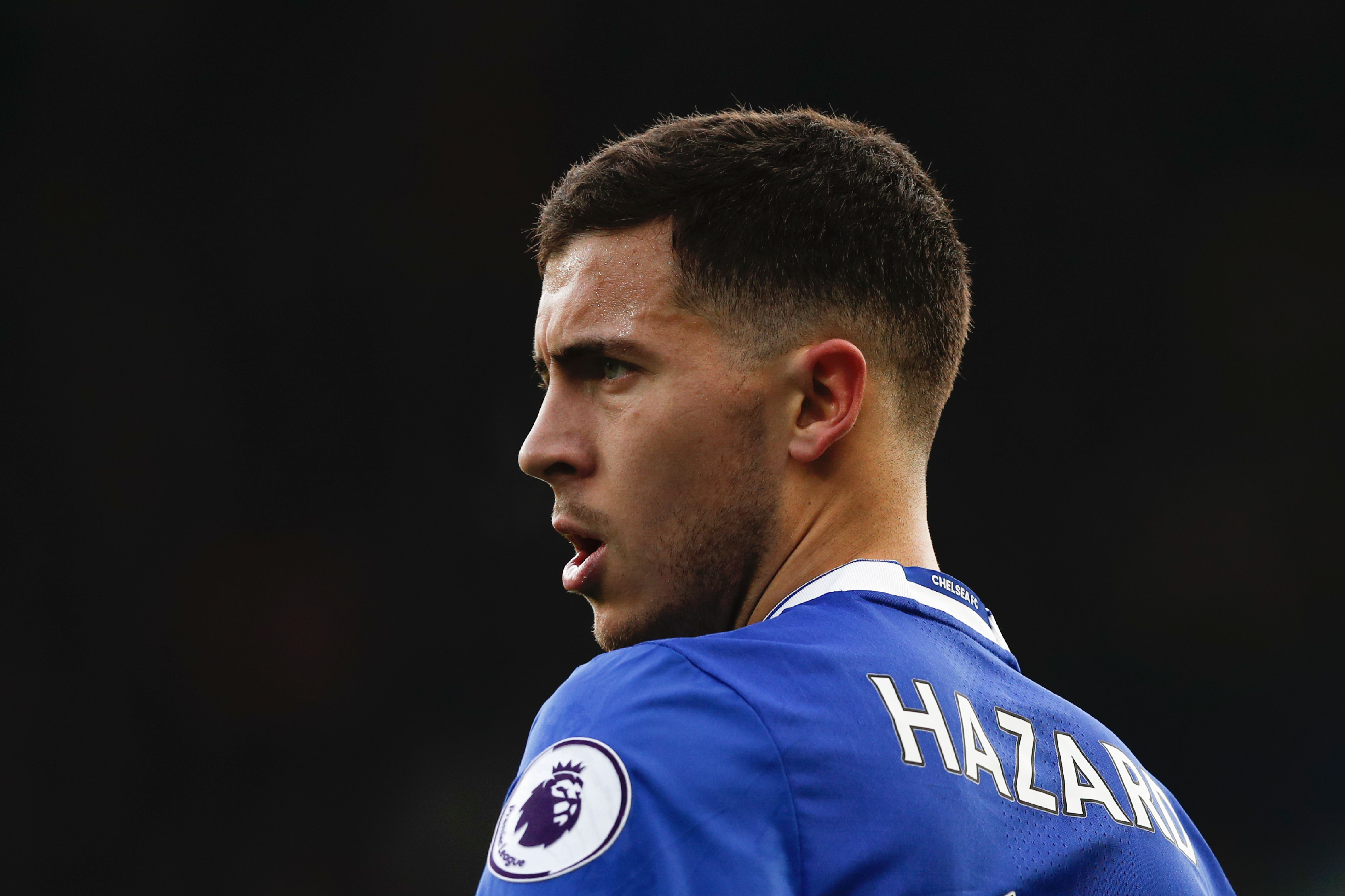 Chelsea's Belgian midfielder Eden Hazard plays during the English Premier League football match between Chelsea and Arsenal at Stamford Bridge in London on February 4, 2017. / AFP / Adrian DENNIS / RESTRICTED TO EDITORIAL USE. No use with unauthorized audio, video, data, fixture lists, club/league logos or 'live' services. Online in-match use limited to 75 images, no video emulation. No use in betting, games or single club/league/player publications. / (Photo credit should read ADRIAN DENNIS/AFP/Getty Images)