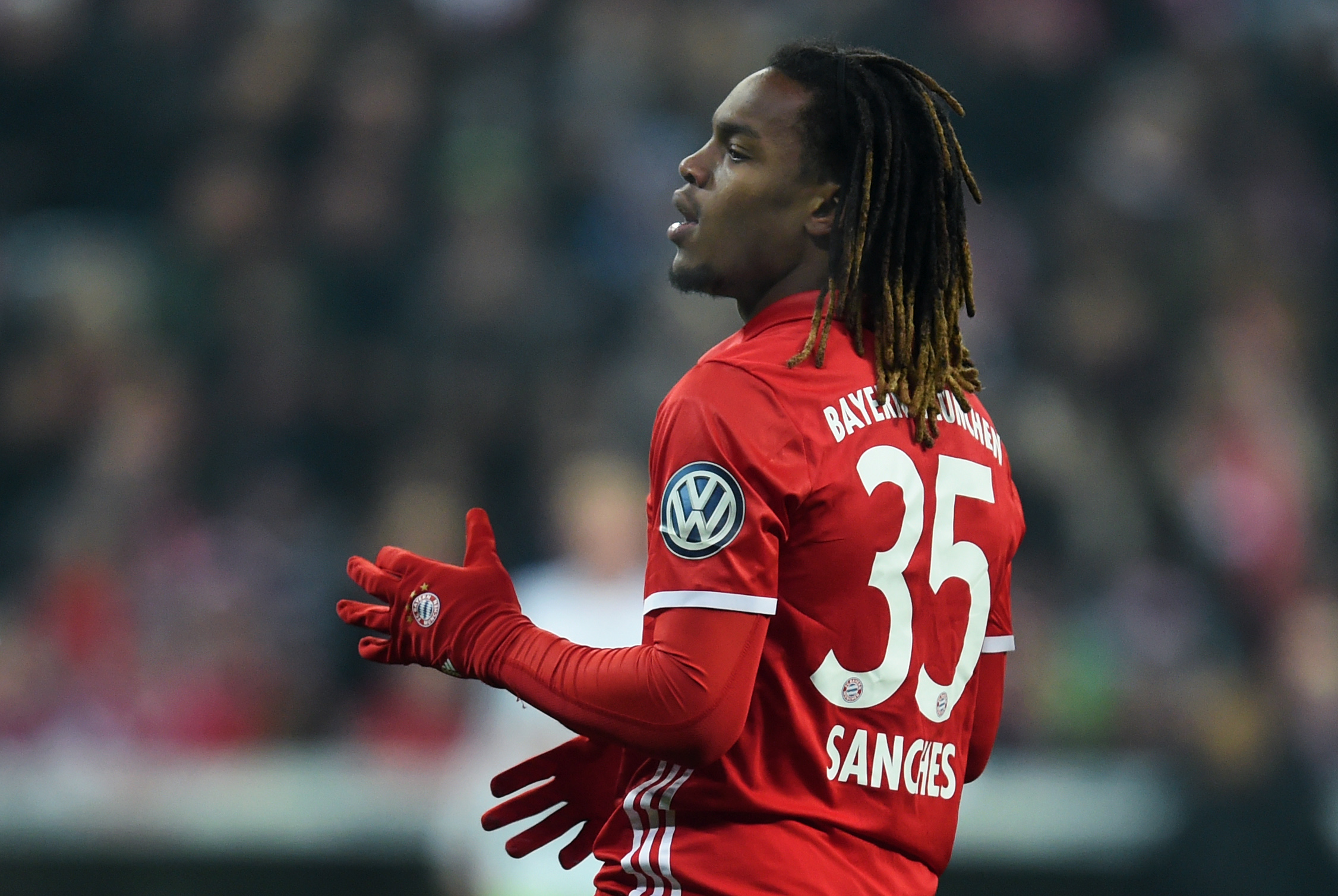 Bayern Munich's Portuguese midfielder Renato Sanches gestures during the German Cup DFB Pokal Round of 16 football match FC Bayern Munich v VFL Wolfburg in Munich, southern Germany on February 7, 2017. / AFP / Christof STACHE / RESTRICTIONS: ACCORDING TO DFB RULES IMAGE SEQUENCES TO SIMULATE VIDEO IS NOT ALLOWED DURING MATCH TIME. MOBILE (MMS) USE IS NOT ALLOWED DURING AND FOR FURTHER TWO HOURS AFTER THE MATCH. == RESTRICTED TO EDITORIAL USE == FOR MORE INFORMATION CONTACT DFB DIRECTLY AT +49 69 67880
/ (Photo credit should read CHRISTOF STACHE/AFP/Getty Images)