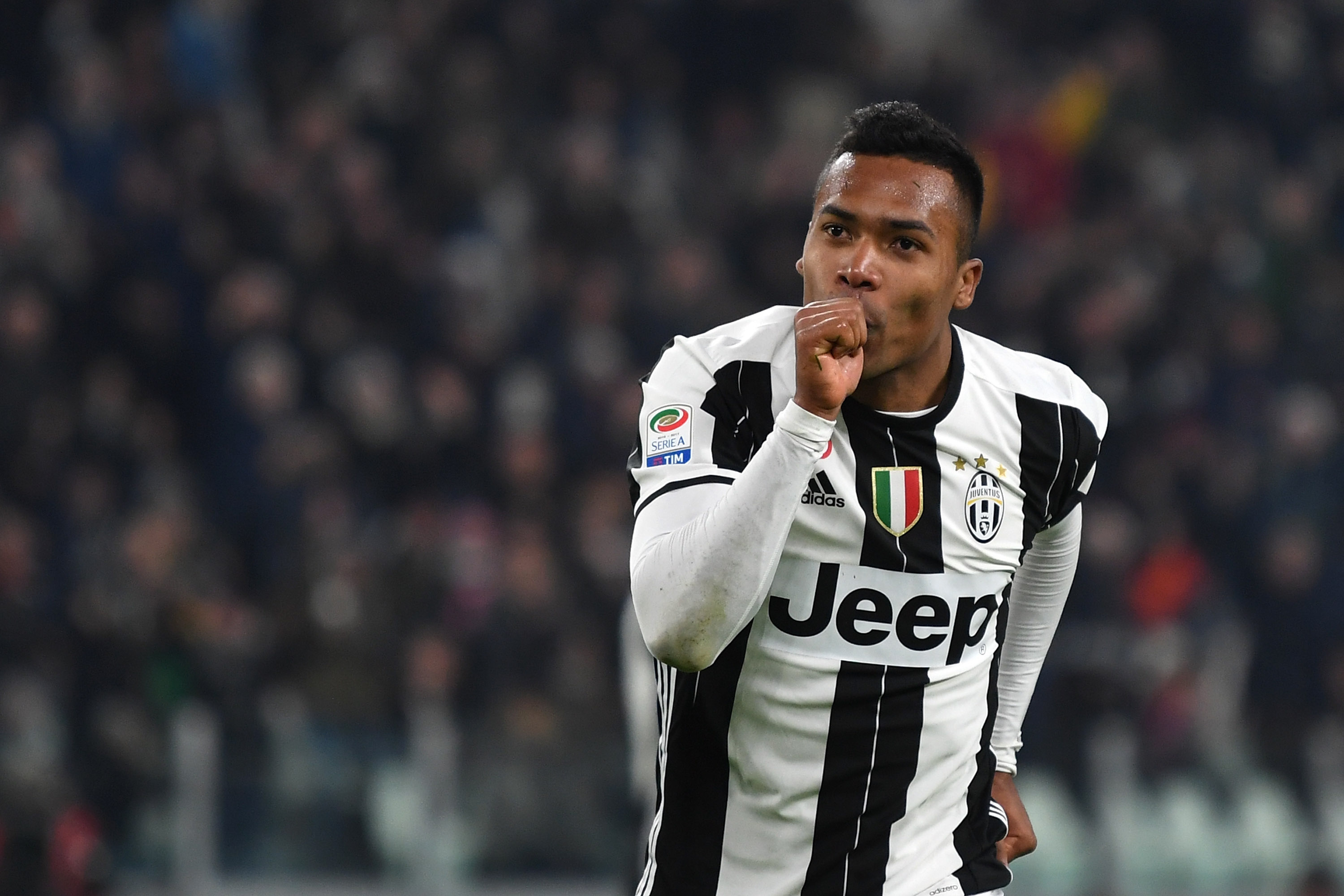 TURIN, ITALY - FEBRUARY 25: Alex Sandro of Juventus FC celebrates a goal during the Serie A match between Juventus FC and Empoli FC at Juventus Stadium on February 25, 2017 in Turin, Italy. (Photo by Valerio Pennicino/Getty Images)